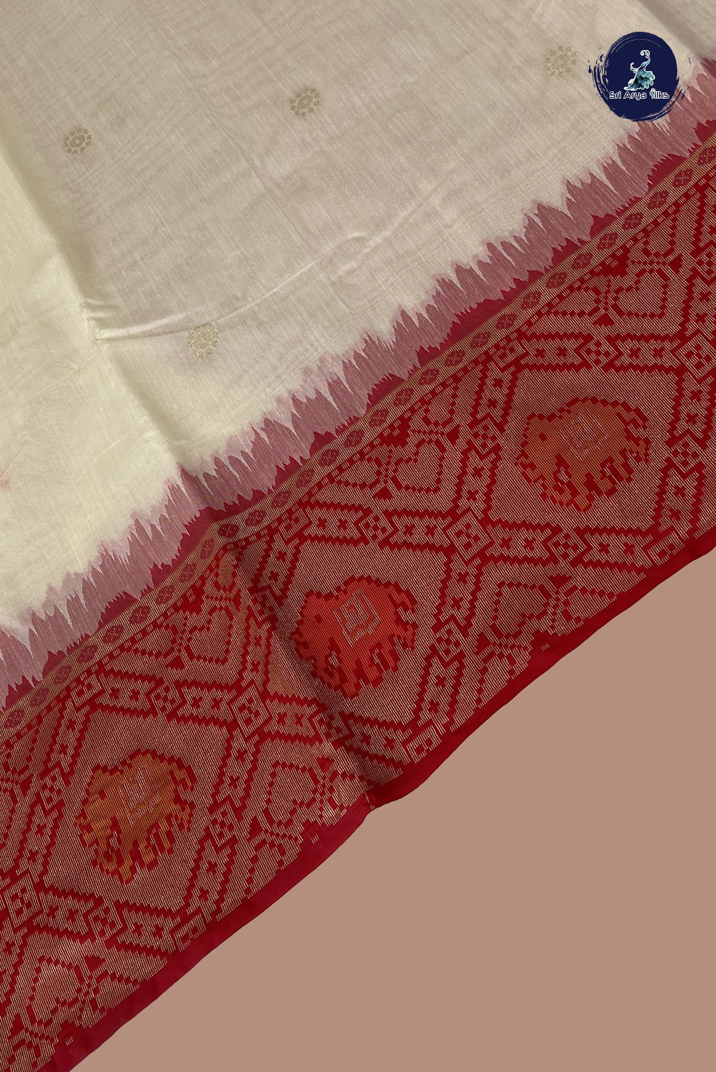 Off White Semi Raw Silk Saree With Zari Buttas Pattern