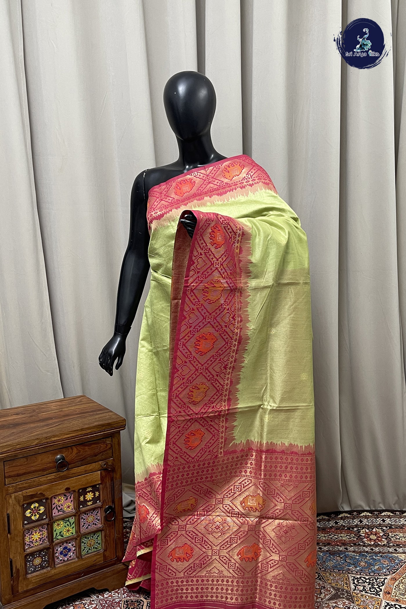 Green Semi Raw Silk Saree With Zari Buttas Pattern