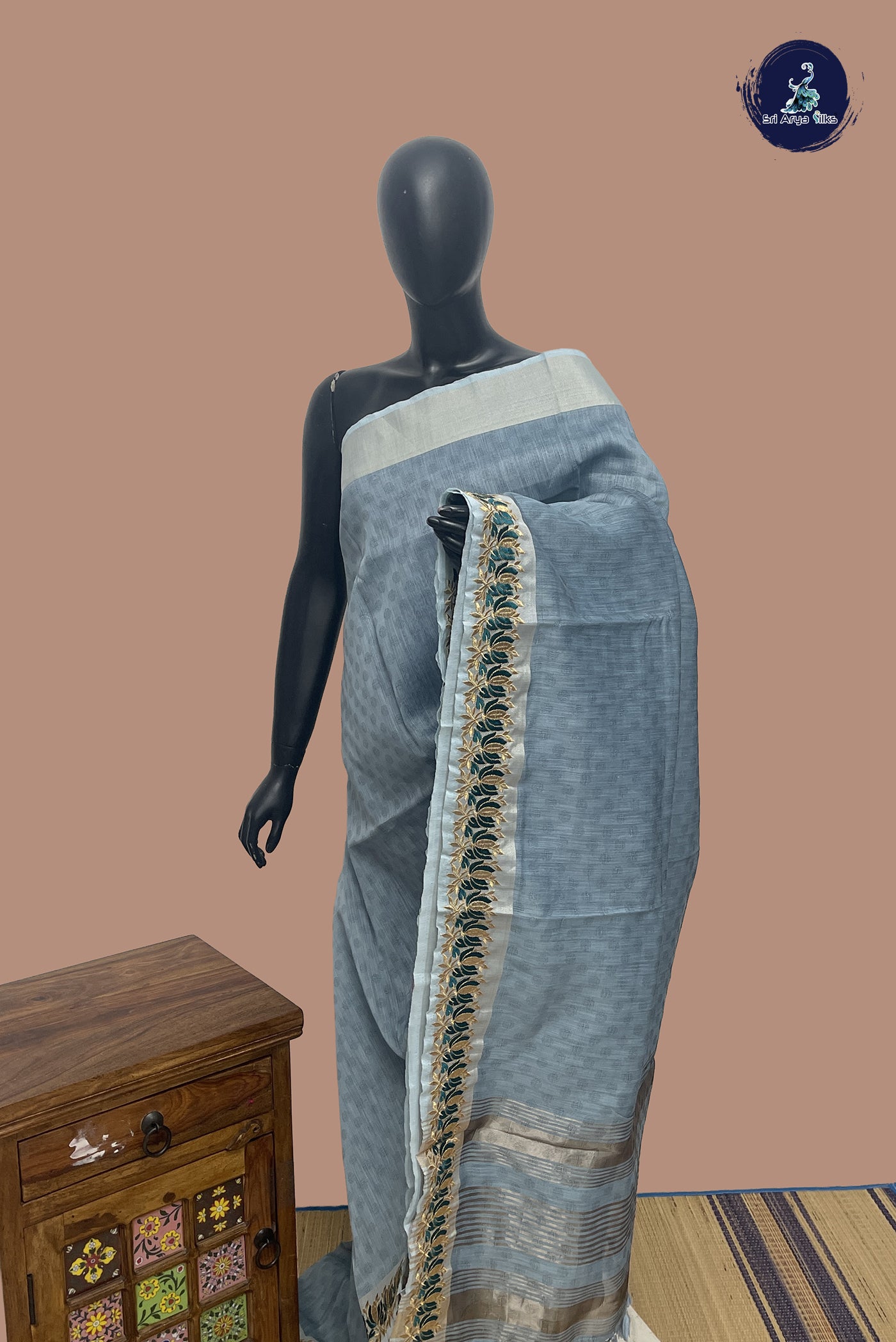 Blue Semi Raw Silk Saree With Embossed Pattern