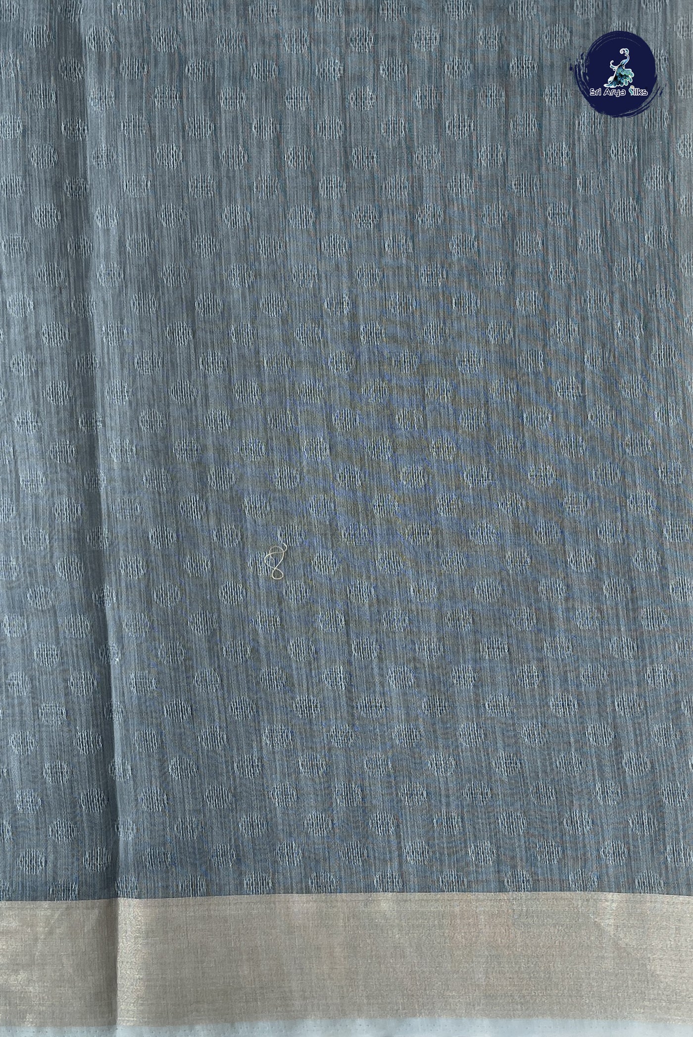 Blue Semi Raw Silk Saree With Embossed Pattern