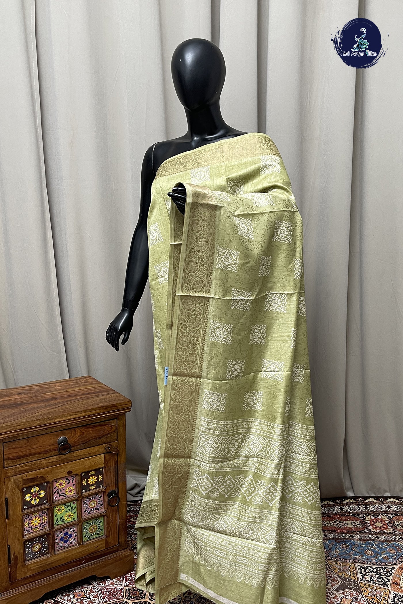 Pastel Shade Semi Grape Silk Saree With Embossed Pattern