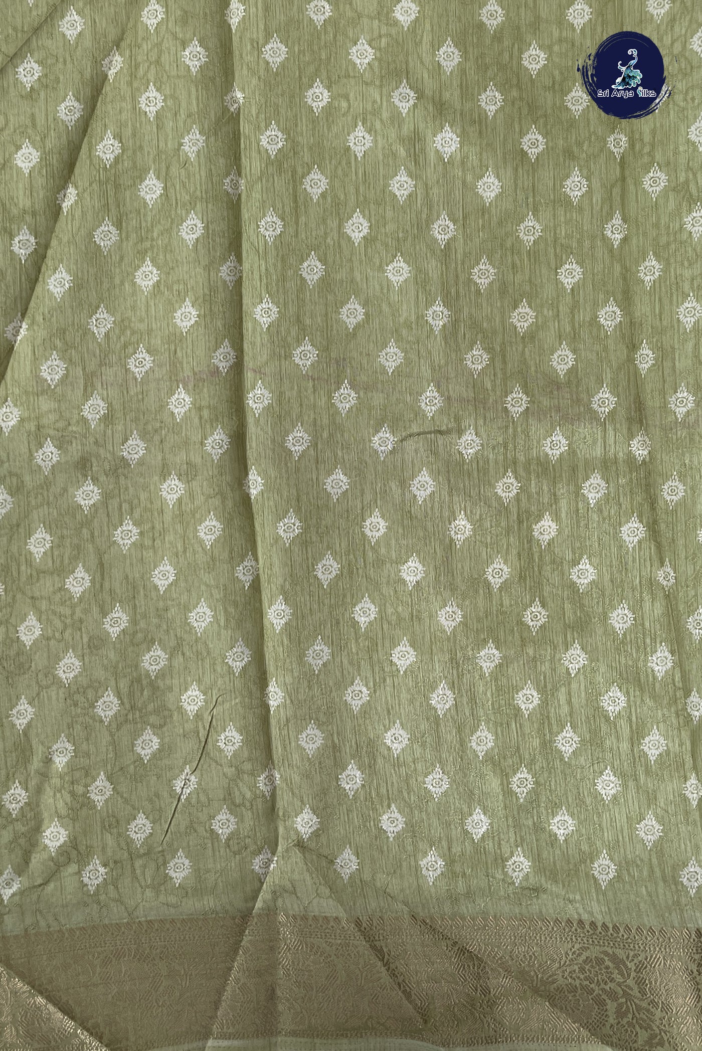 Pastel Shade Semi Grape Silk Saree With Embossed Pattern