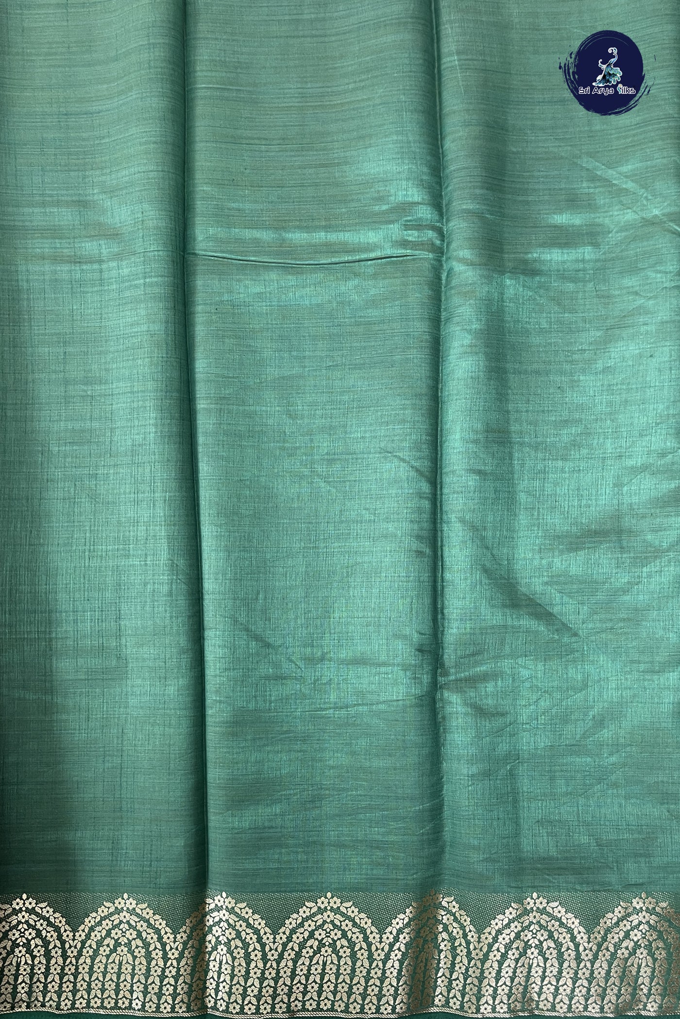Dark Green Semi Tussar Saree With Plain Pattern
