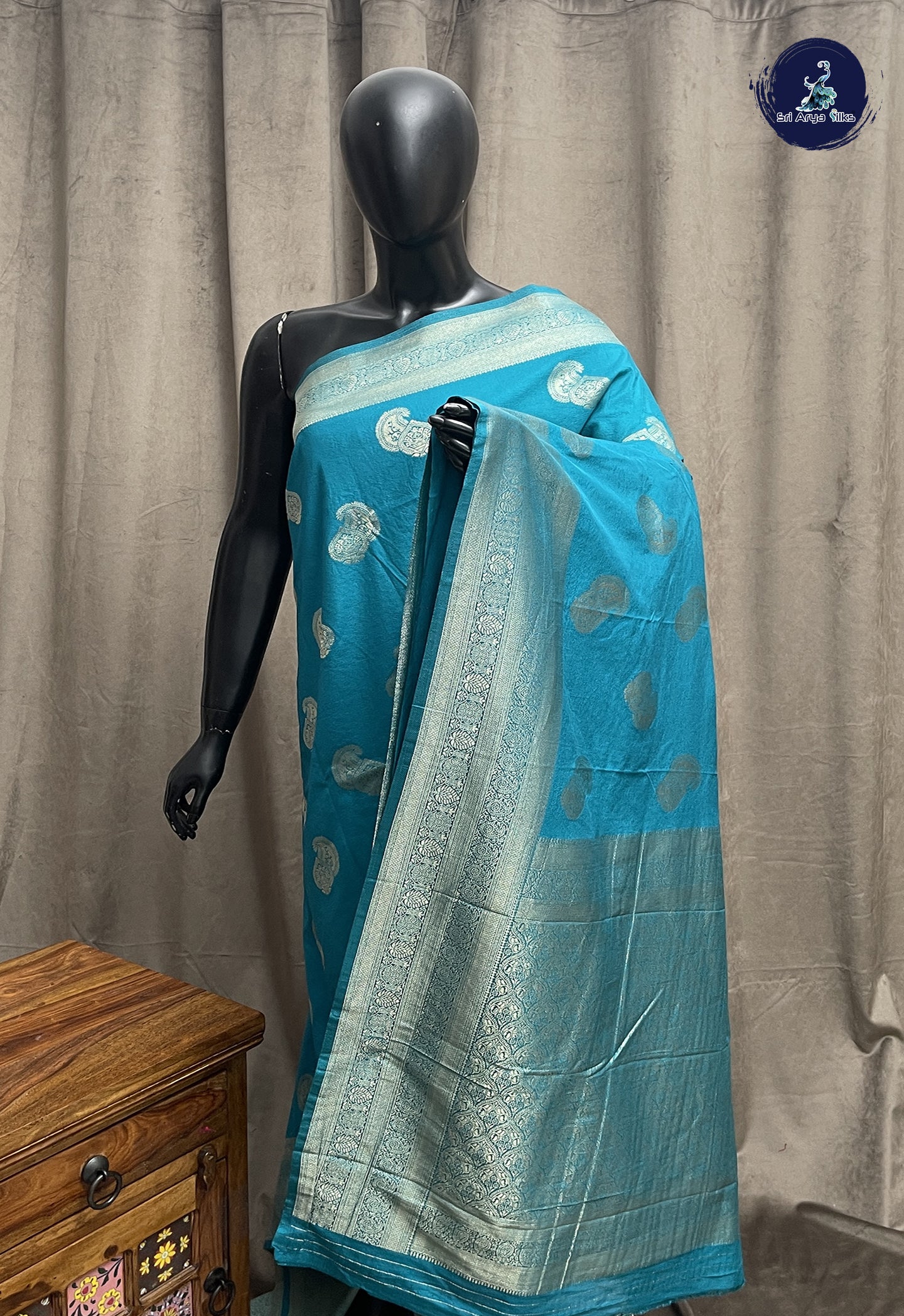 Teal Blue Georgette Banarasi Saree With Zari Buttas Pattern