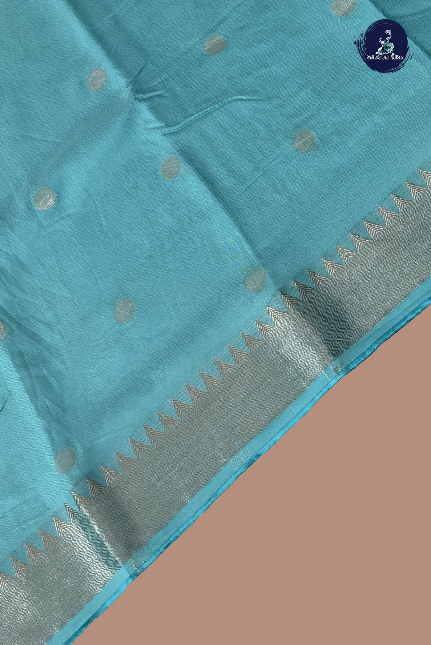 Light Blue Semi Tussar Saree With Embossed Pattern