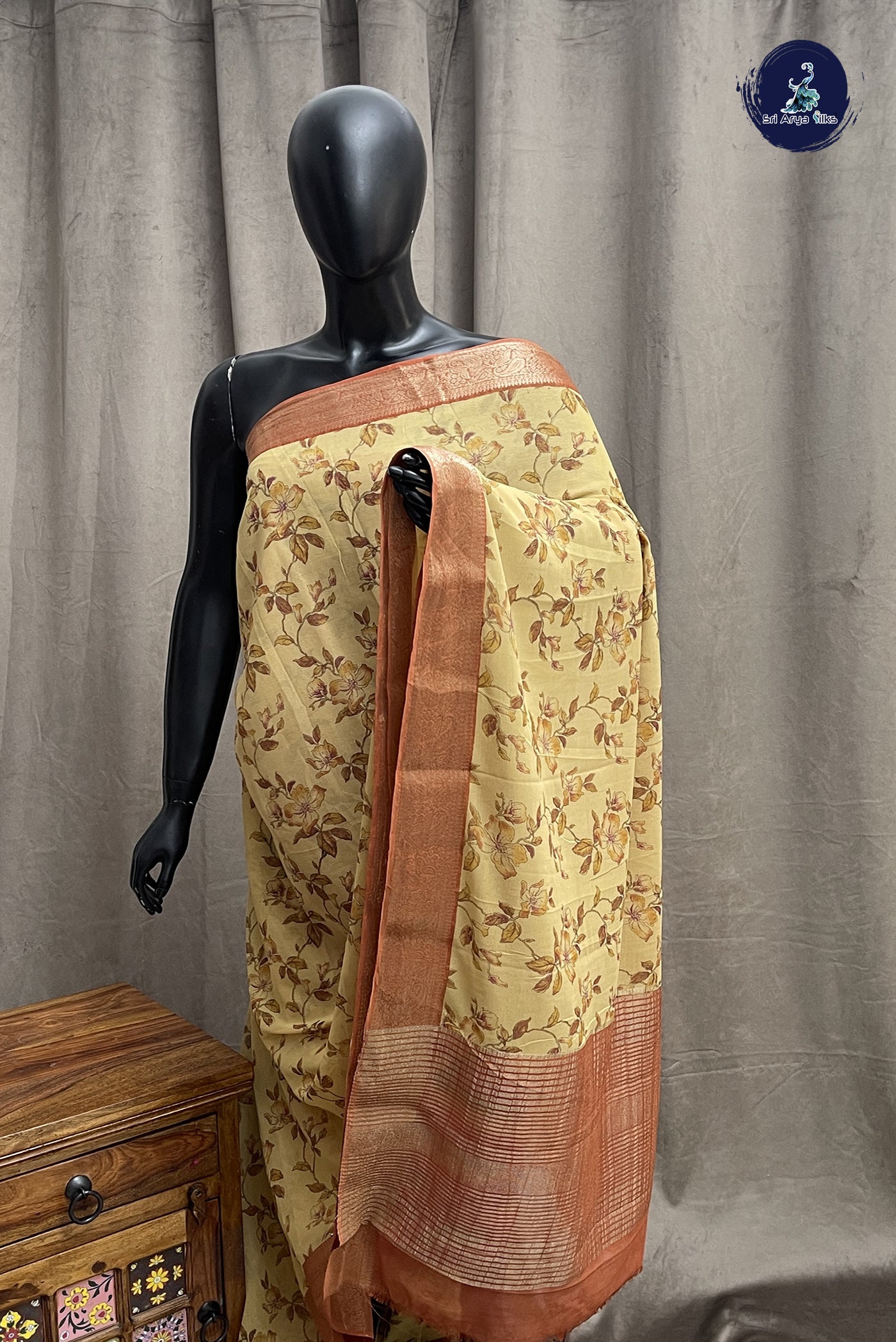 Creamish Yellow Chiffon Saree With Printed Pattern