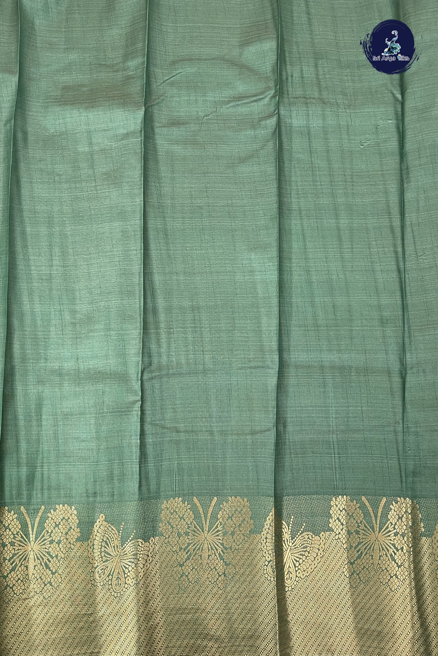 Dark Green Semi Tussar Saree With Plain Pattern