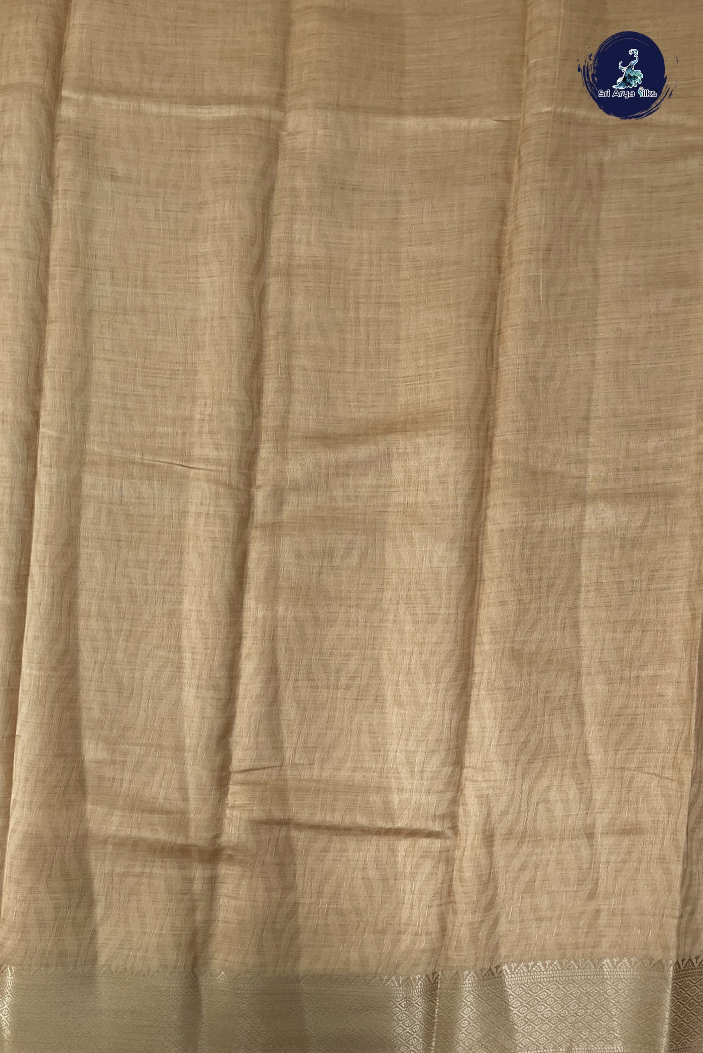 Beige Semi Tussar Saree With Embossed Pattern