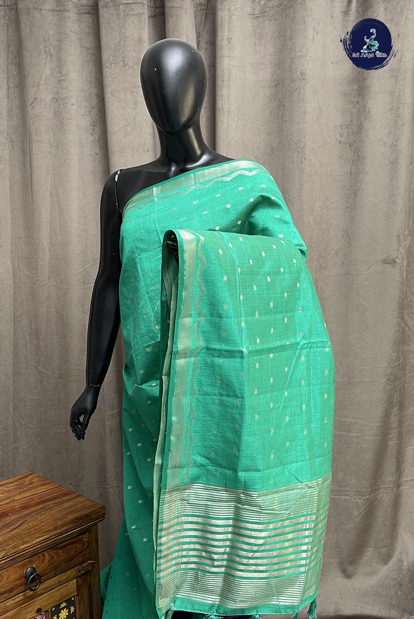 Teal Semi Tussar Saree With Zari Buttas Pattern