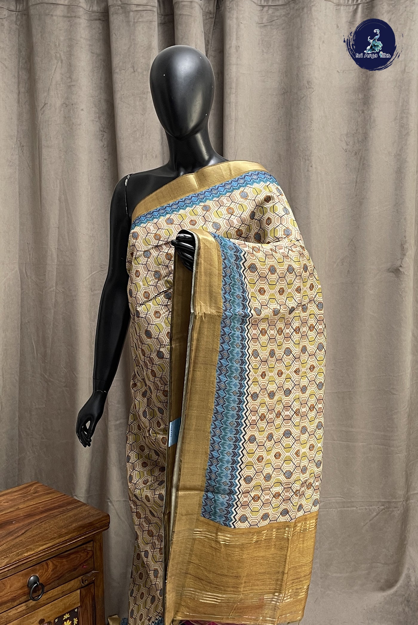 Chikku Shade Semi Chanderi Saree With Printed Pattern
