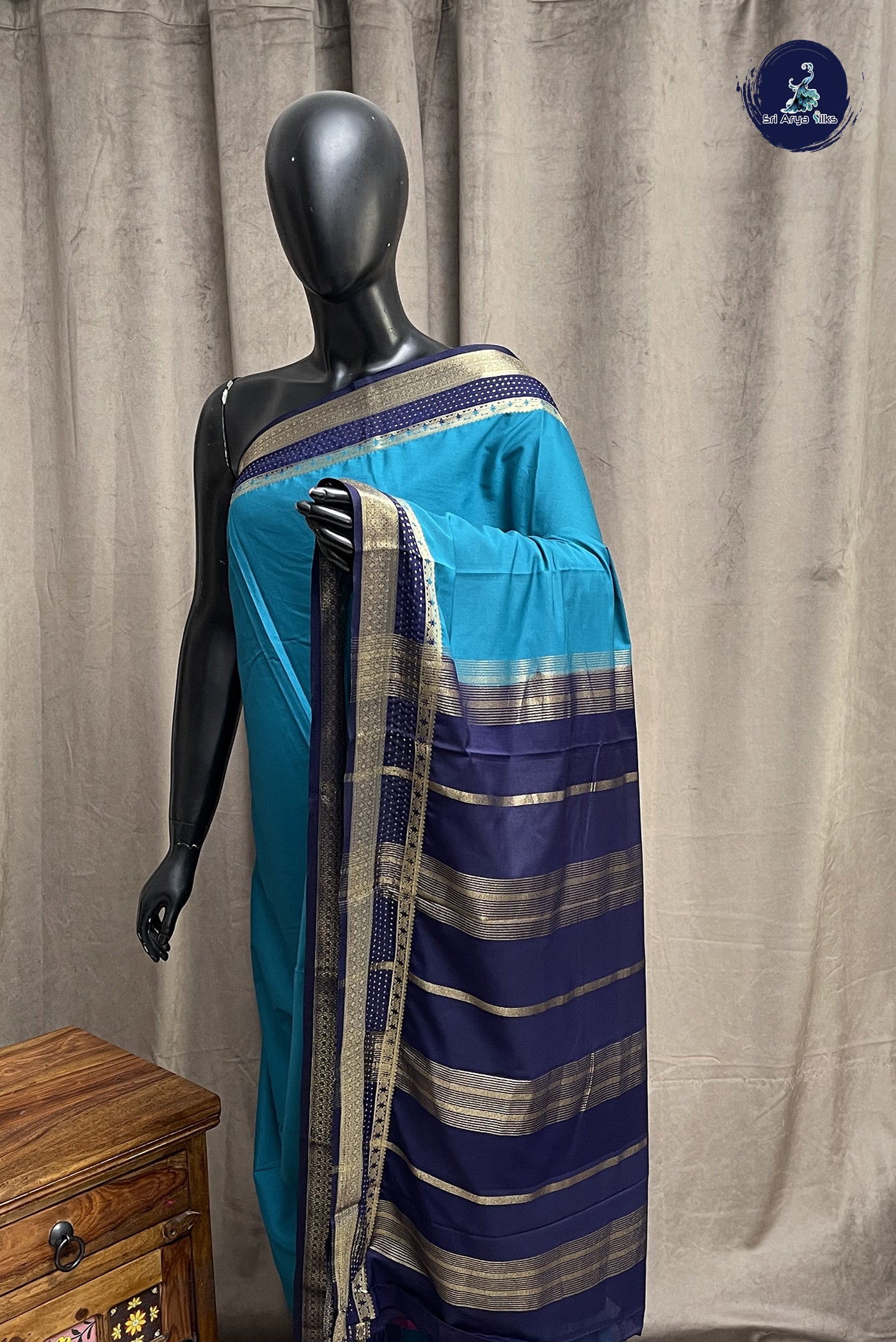 Peacock Blue Semi Mysore Silk With Plain Pattern