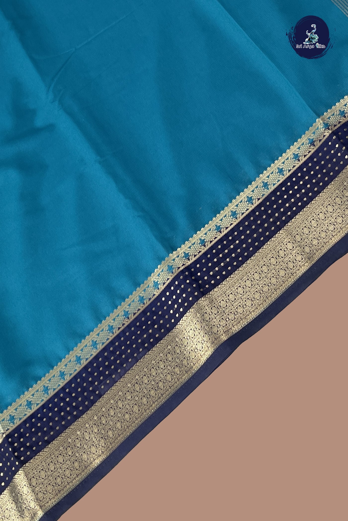 Peacock Blue Semi Mysore Silk With Plain Pattern
