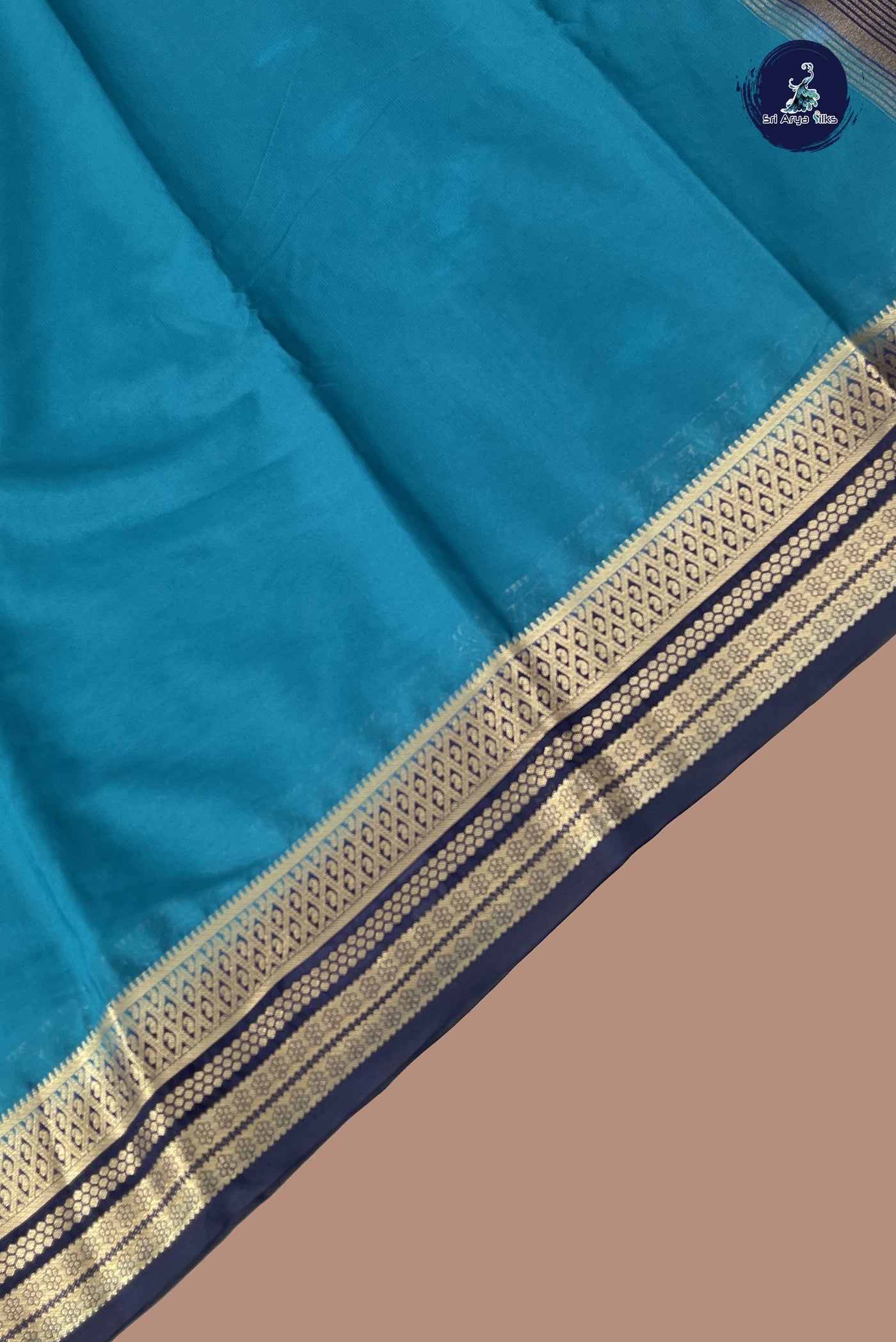 Peacock Blue Semi Mysore Silk With Plain Pattern