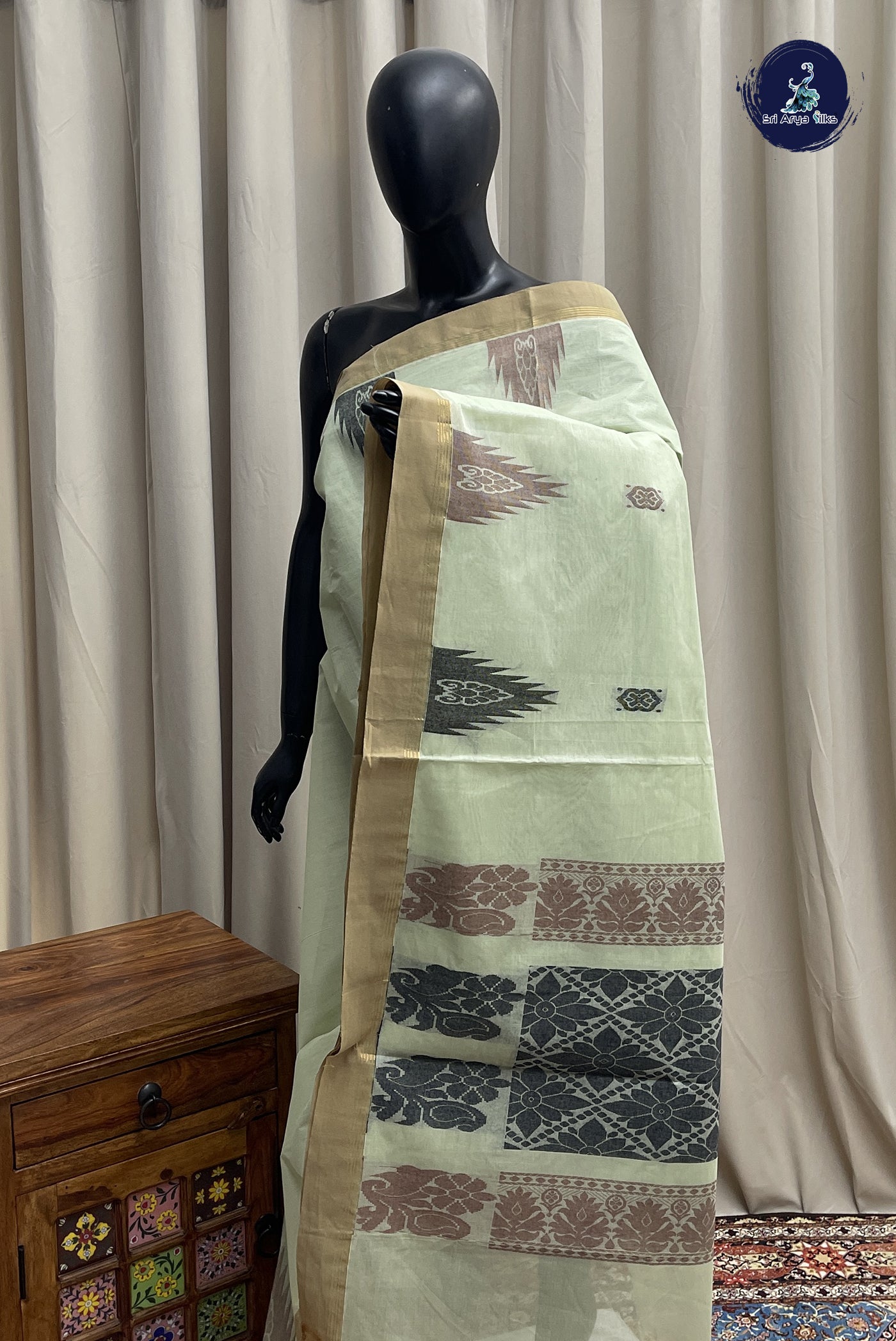 Pastel Green Cotton Saree With Buttas Pattern