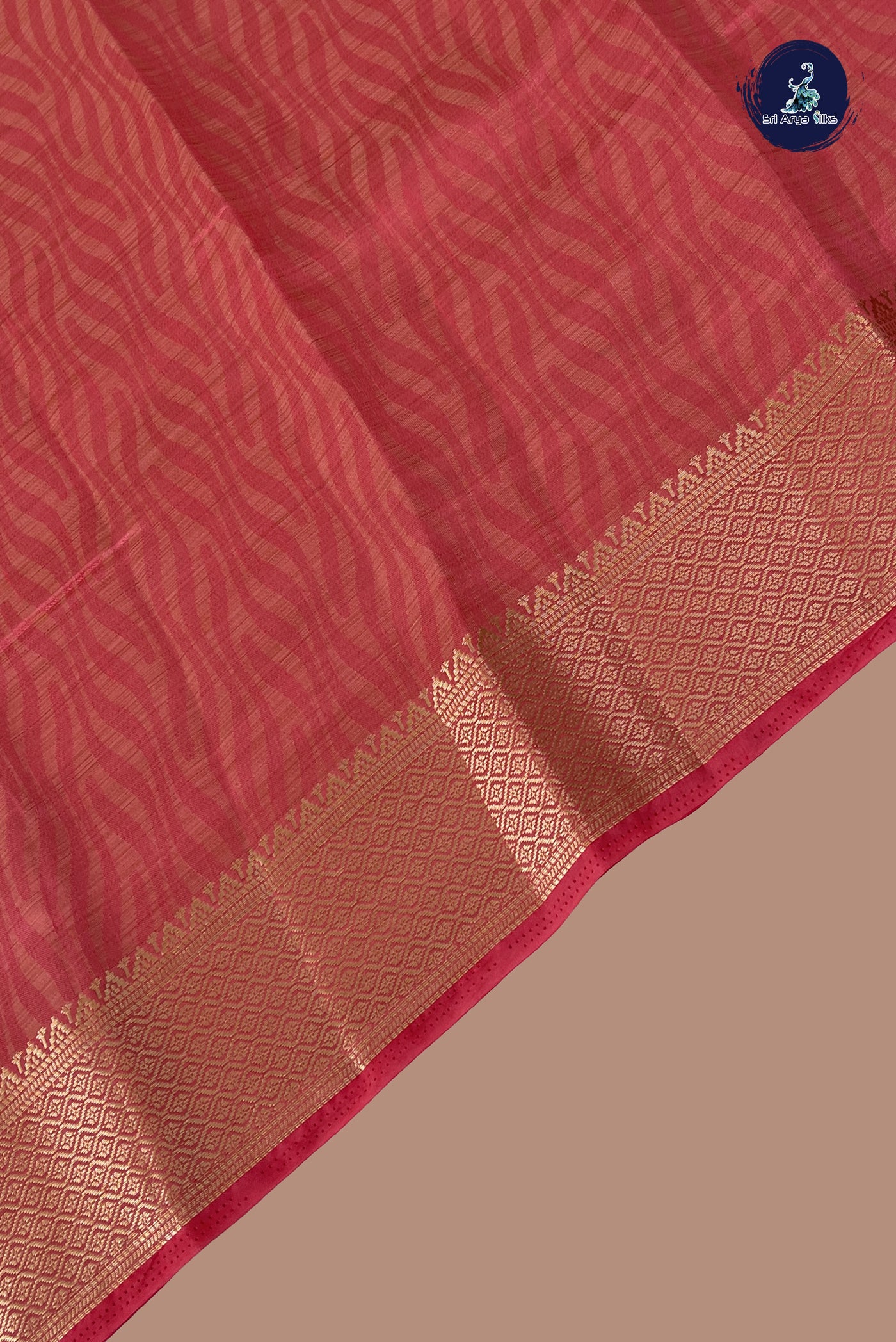 Peach Pink Semi Tussar Saree With Embossed Pattern