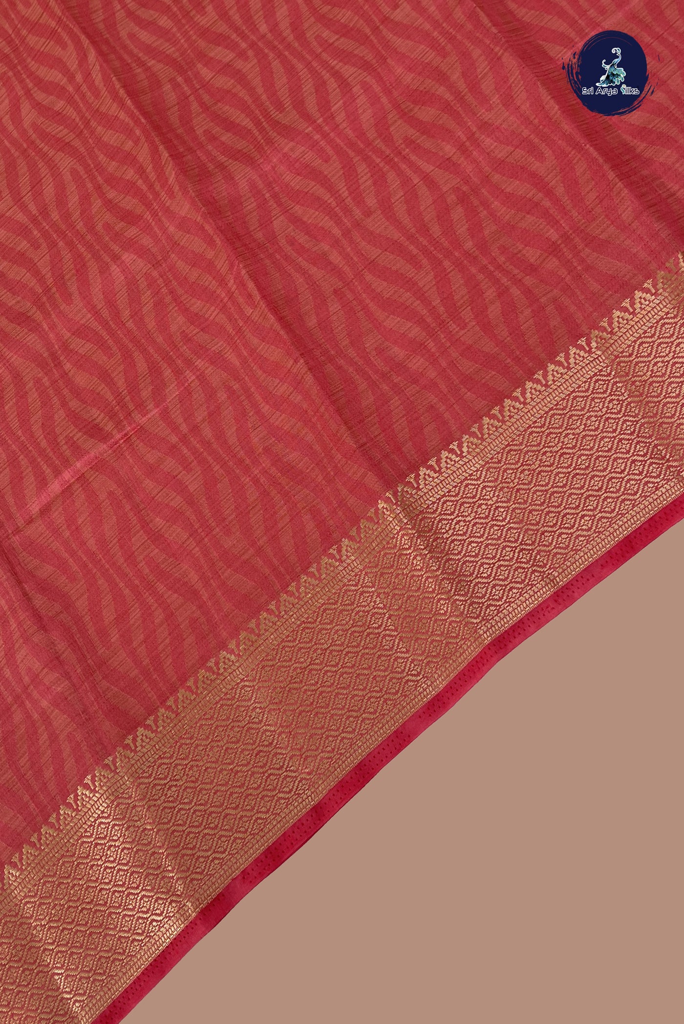 Peach Pink Semi Tussar Saree With Embossed Pattern