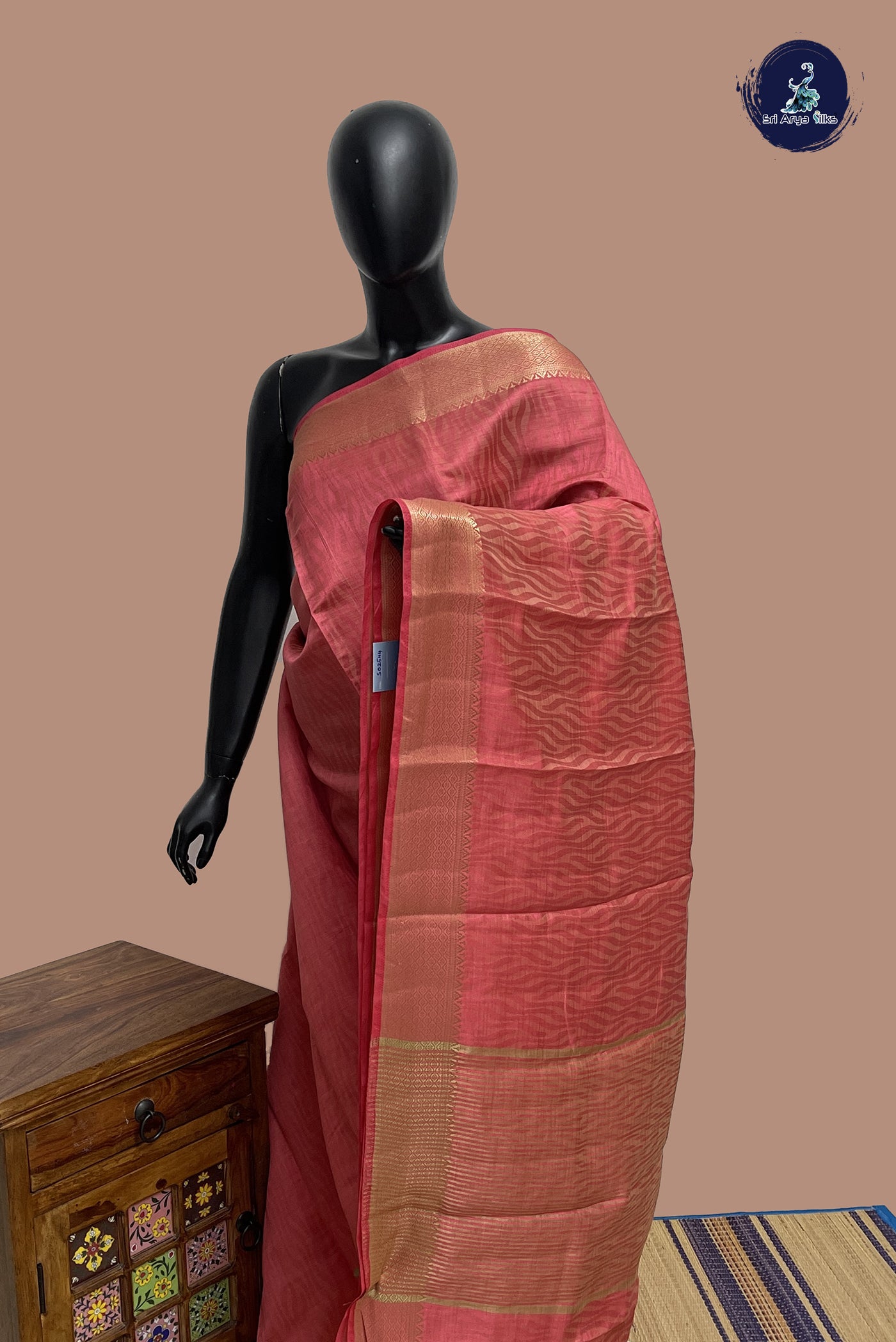 Peach Pink Semi Tussar Saree With Embossed Pattern