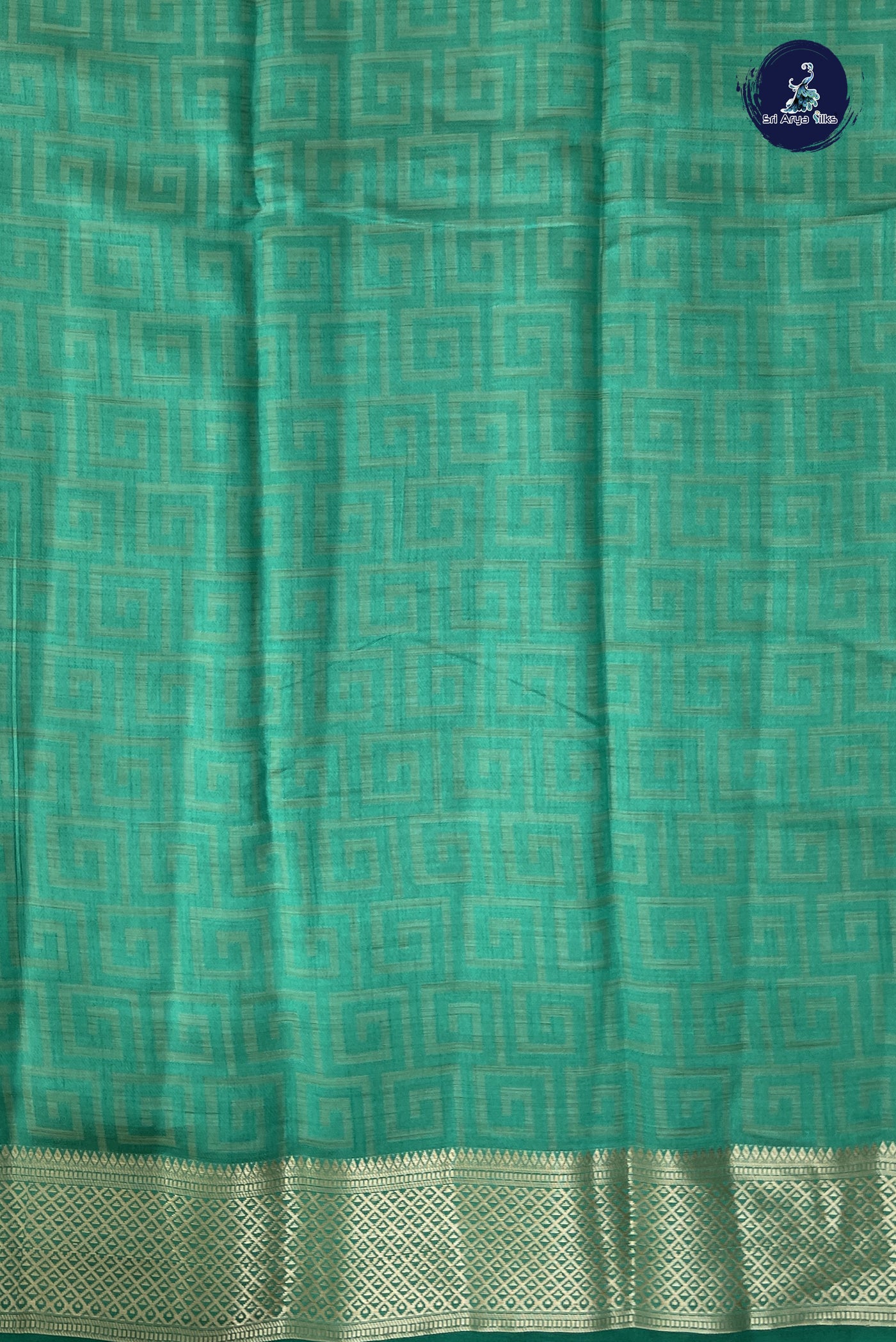 Green Semi Tussar Saree With Embossed Pattern