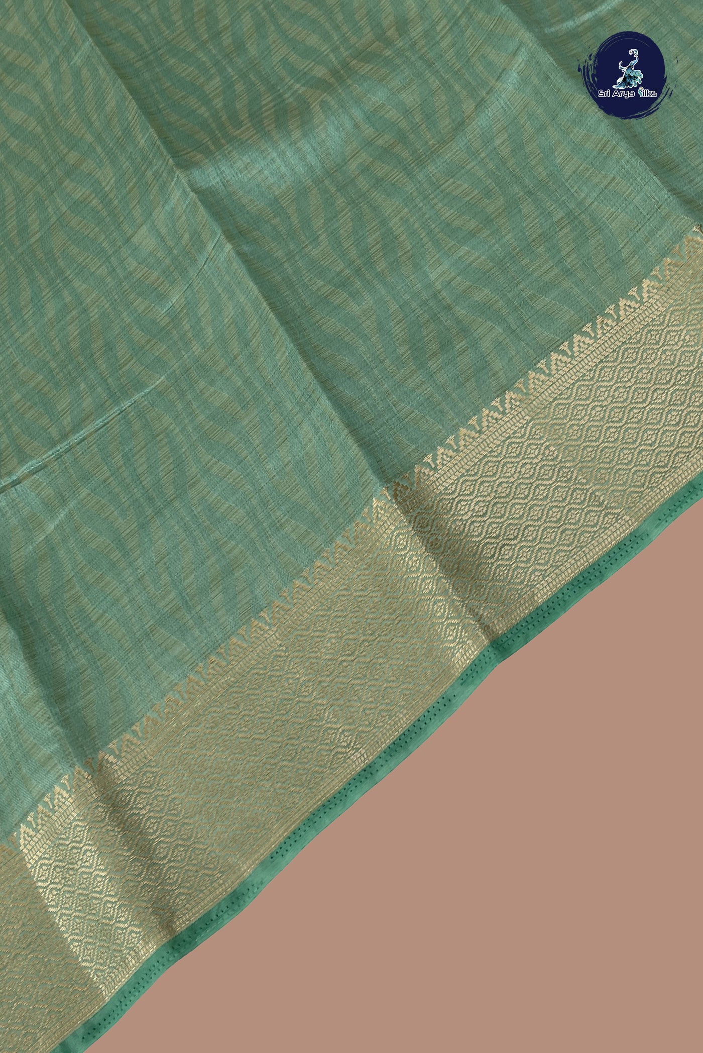 Pastel Green Semi Tussar Saree With Embossed Pattern