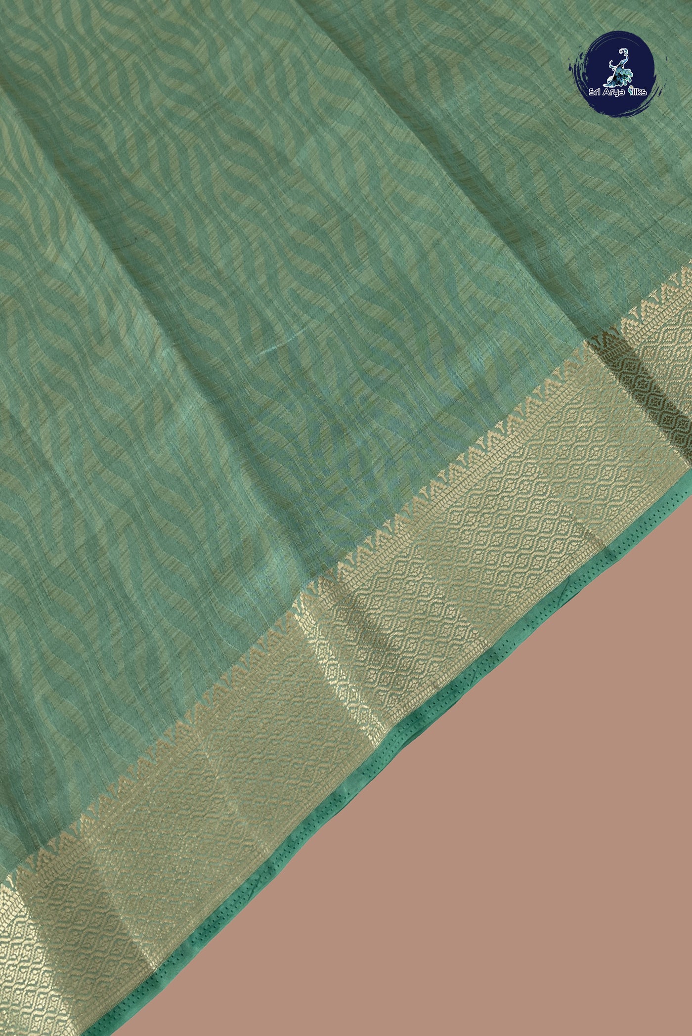 Pastel Green Semi Tussar Saree With Embossed Pattern