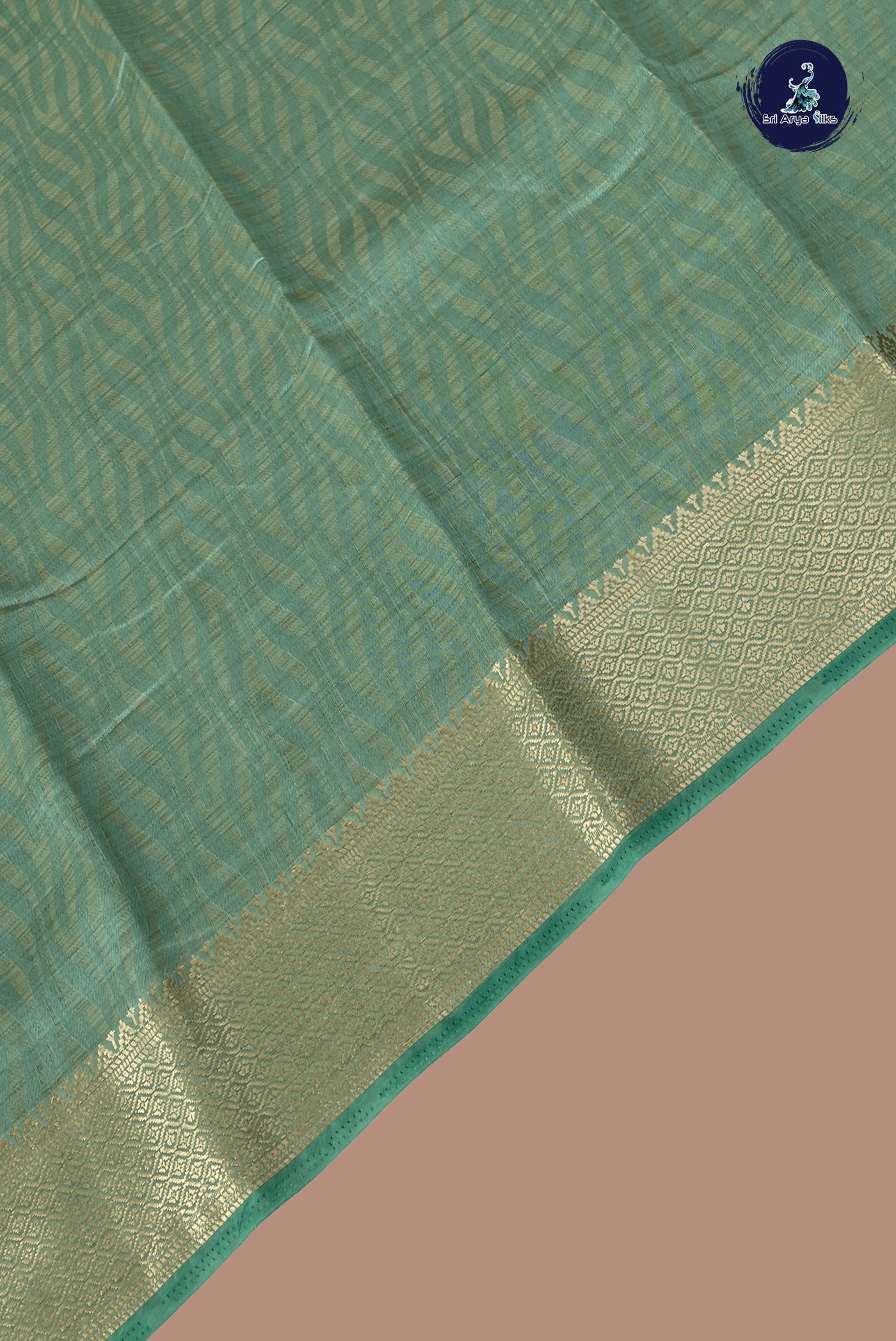 Pastel Green Semi Tussar Saree With Embossed Pattern