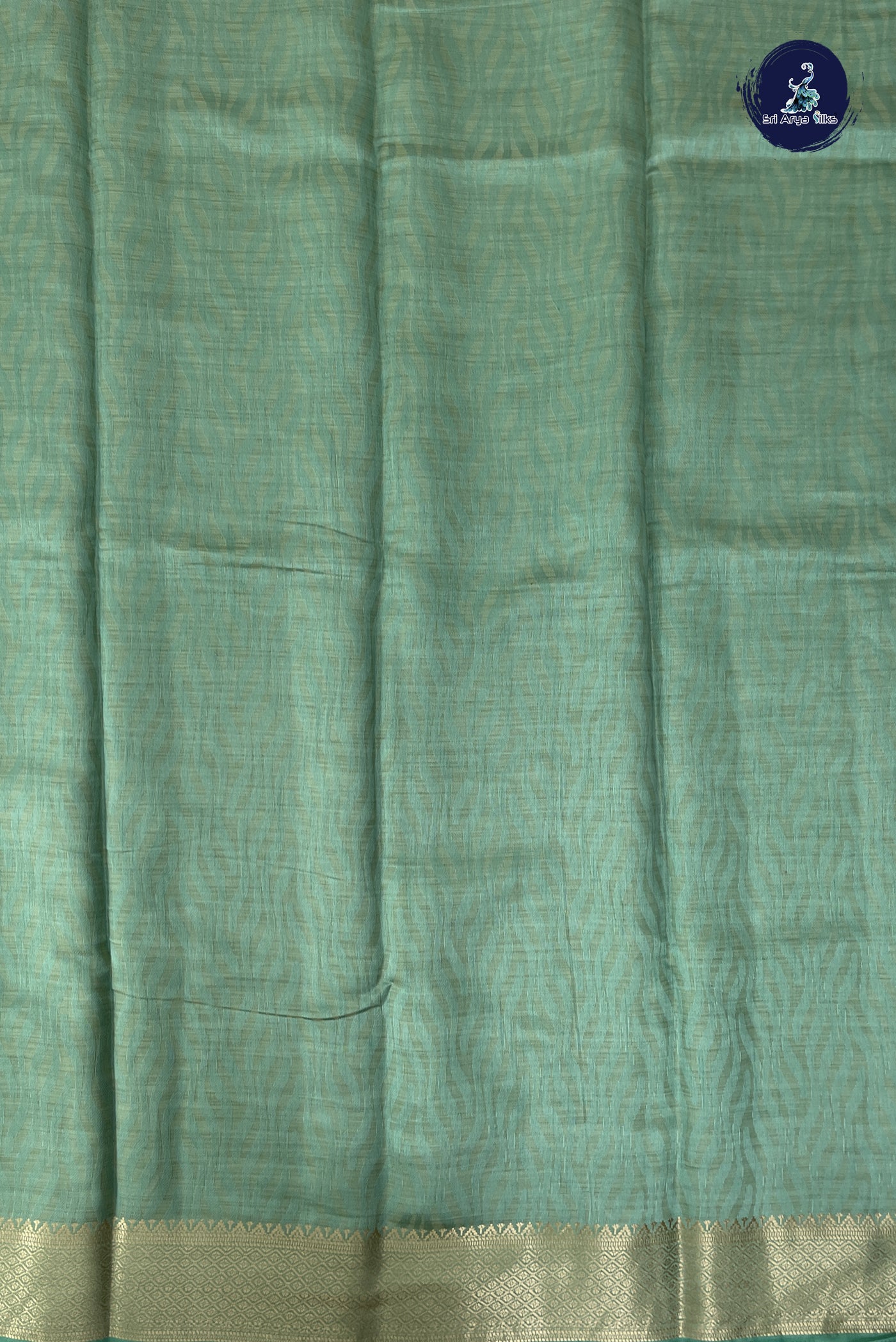 Pastel Green Semi Tussar Saree With Embossed Pattern