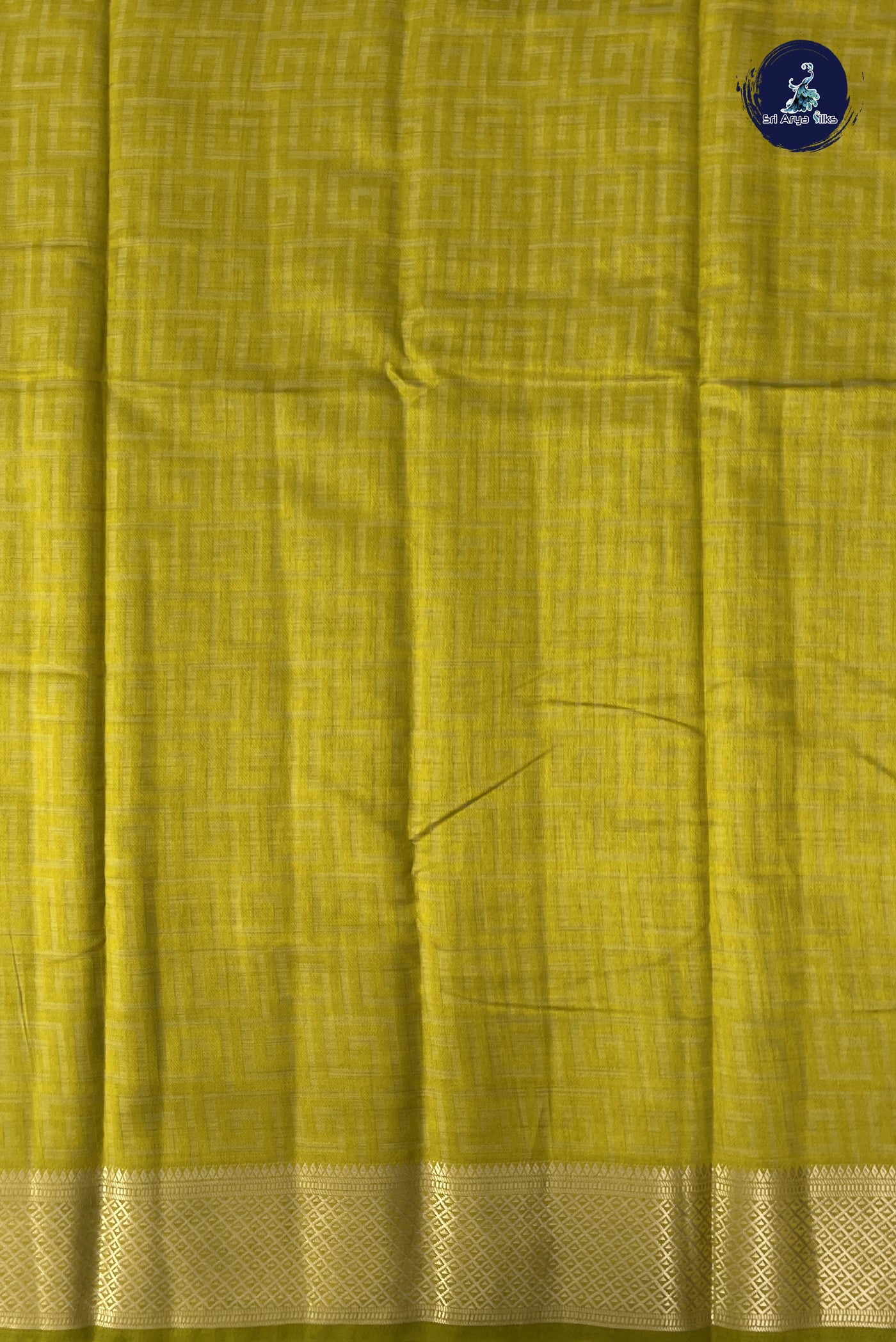 Yellow Semi Tussar Saree With Embossed Pattern