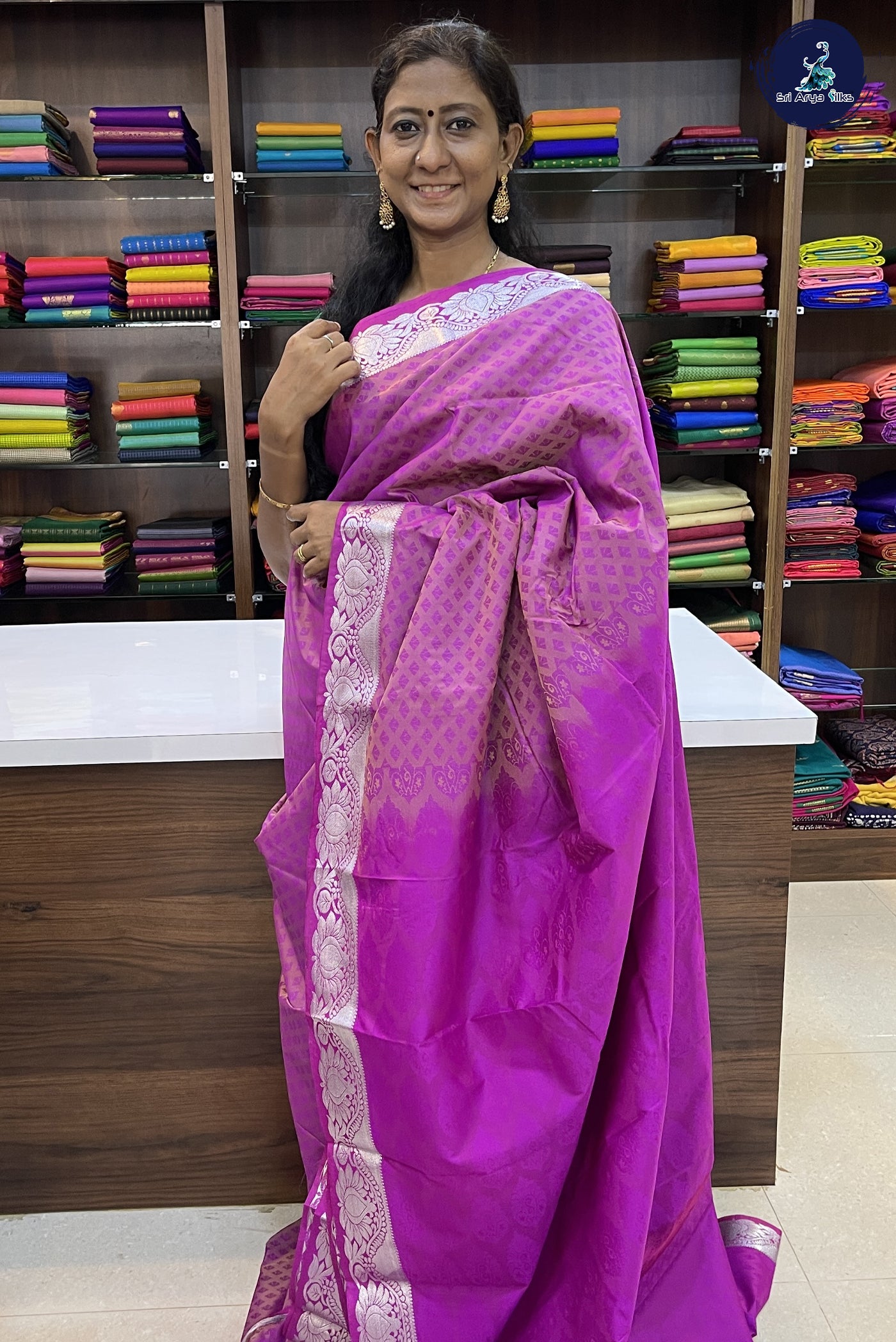 Purple Semi Silk Saree With Embossed Pattern