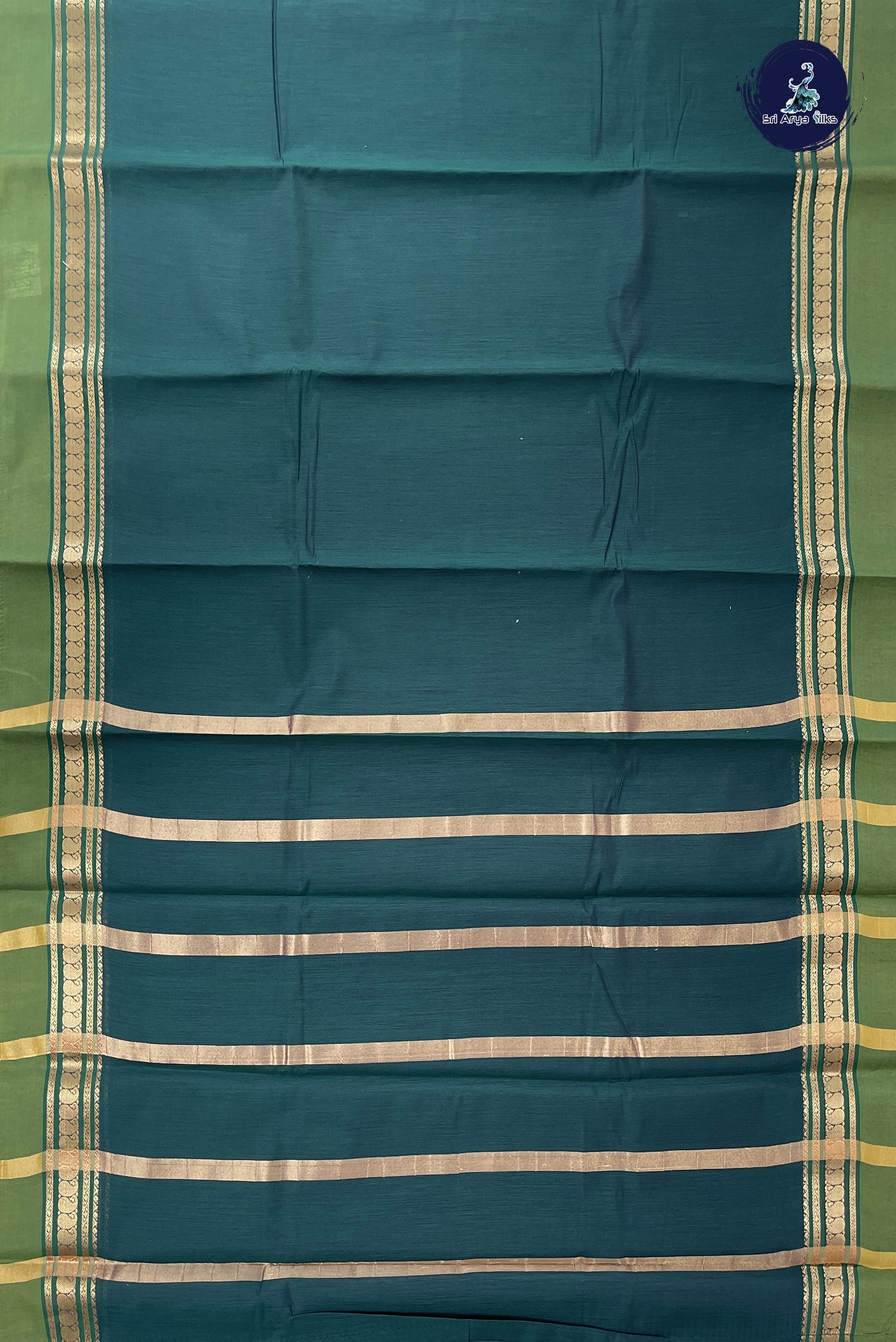 Bottle Green Budget Semi Silk Cotton Saree With Plain Pattern