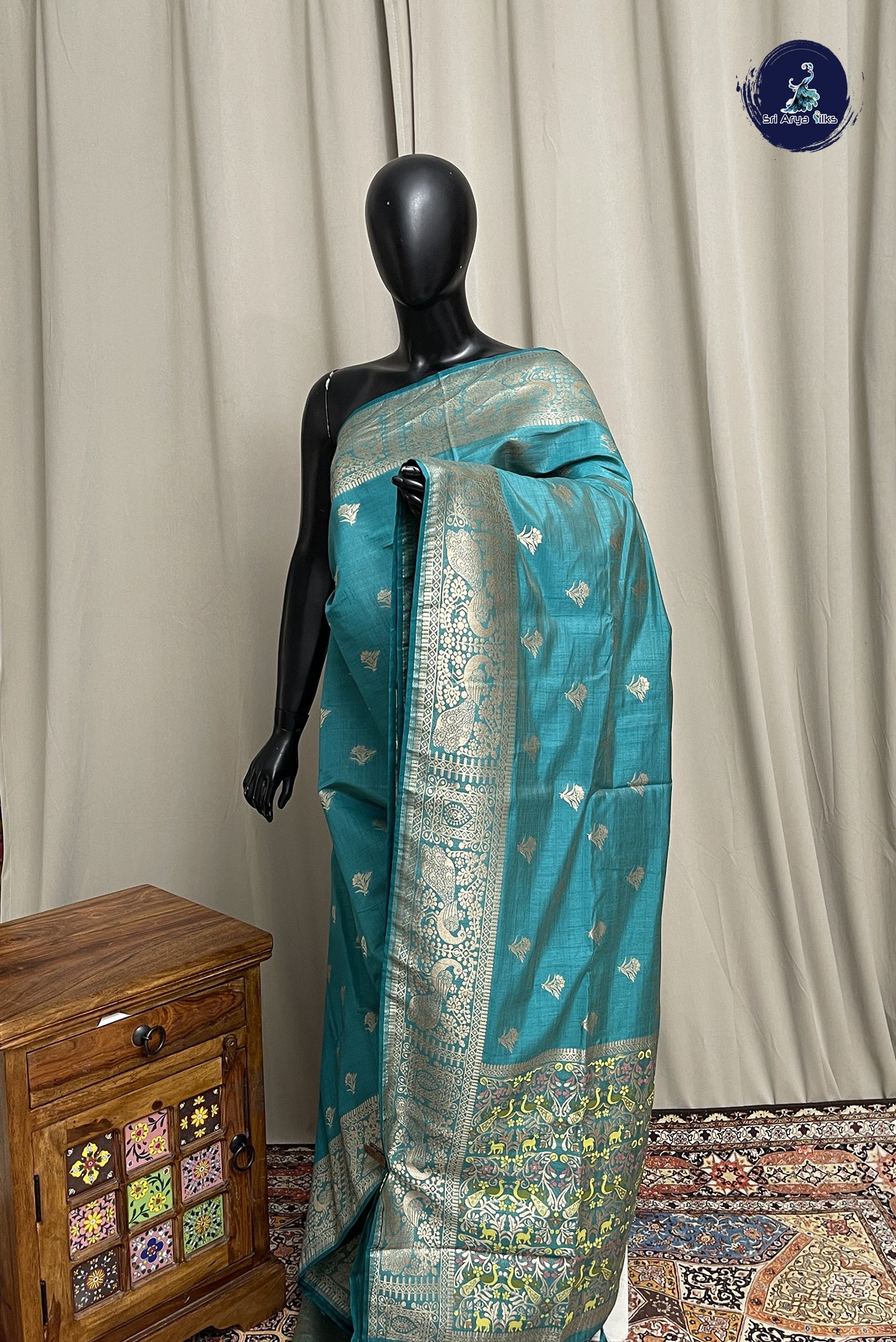 Teal Blue Semi Tussar Saree With Zari Buttas Pattern