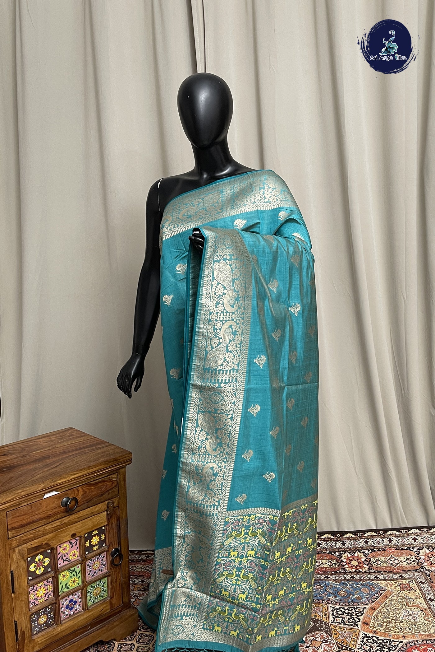 Teal Blue Semi Tussar Saree With Zari Buttas Pattern