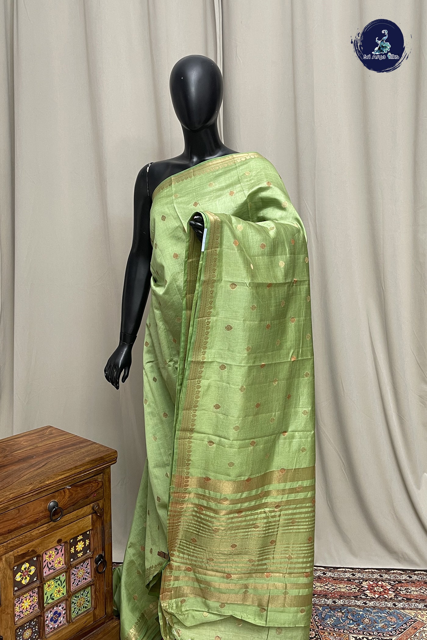 Pista Green Semi Tussar Saree With Zari Buttas Pattern