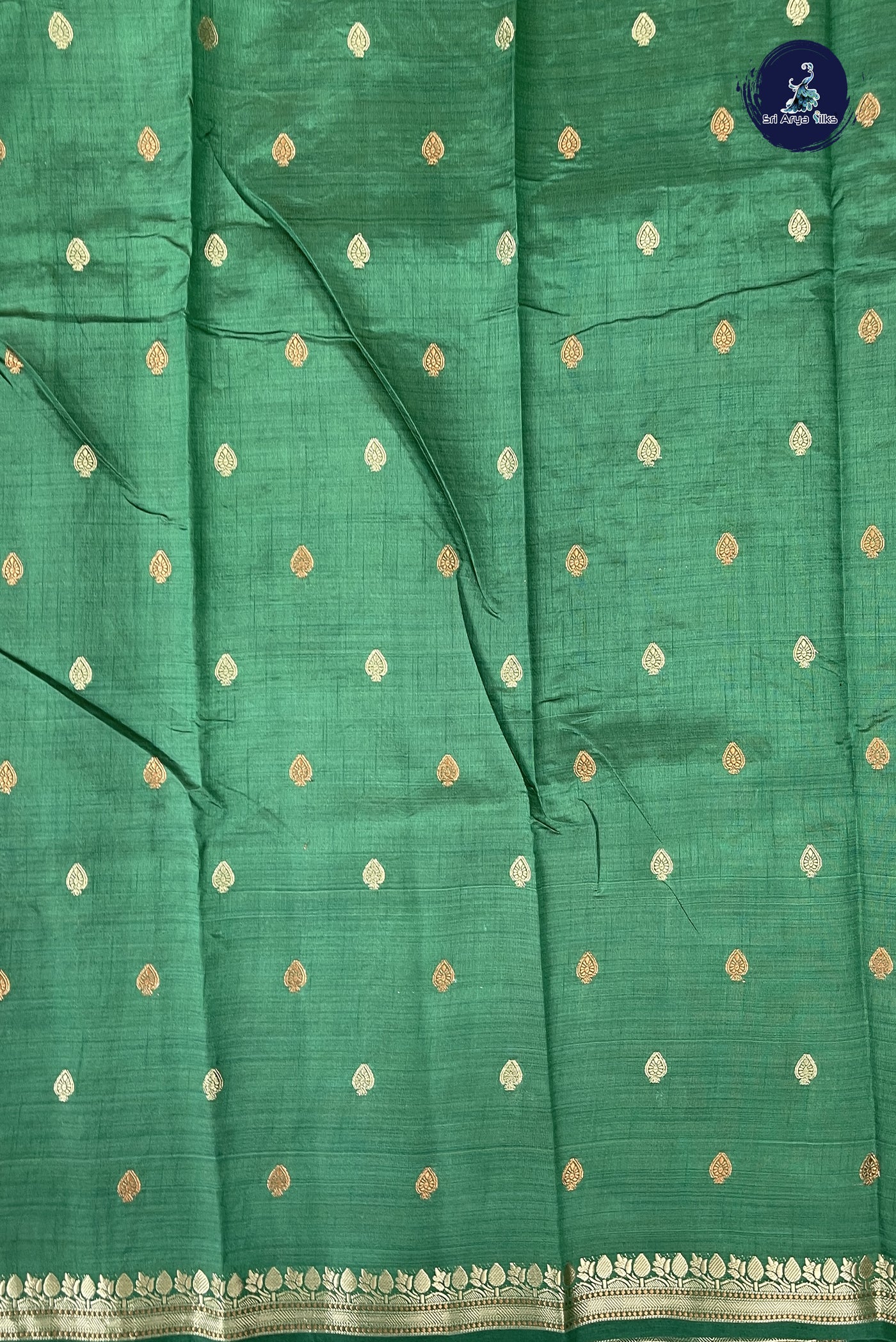 Dark Green Semi Tussar Saree With Zari Buttas Pattern