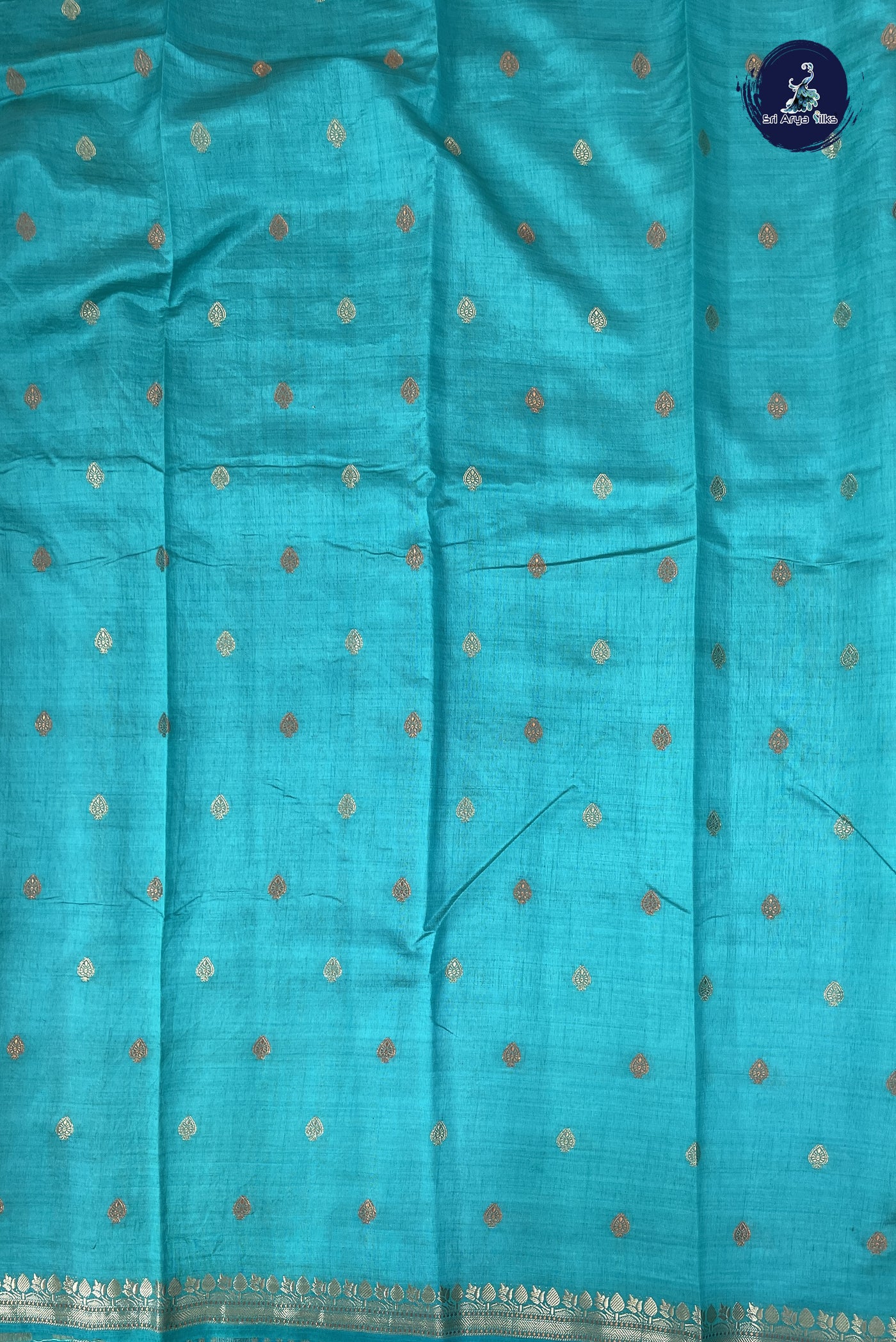 Turquoise Semi Tussar Saree With Zari Buttas Pattern