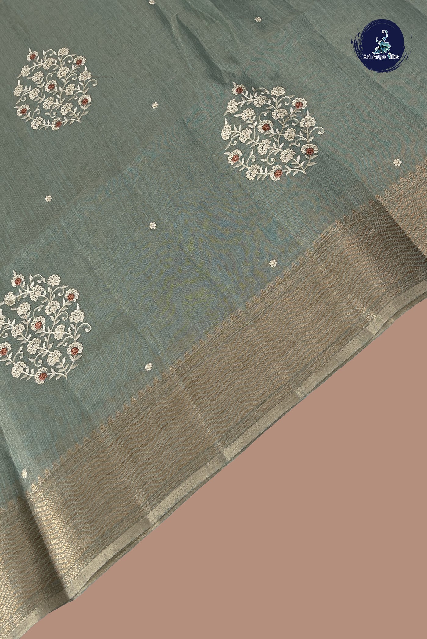 Pastel Shade Linen Saree With Embroidery Pattern