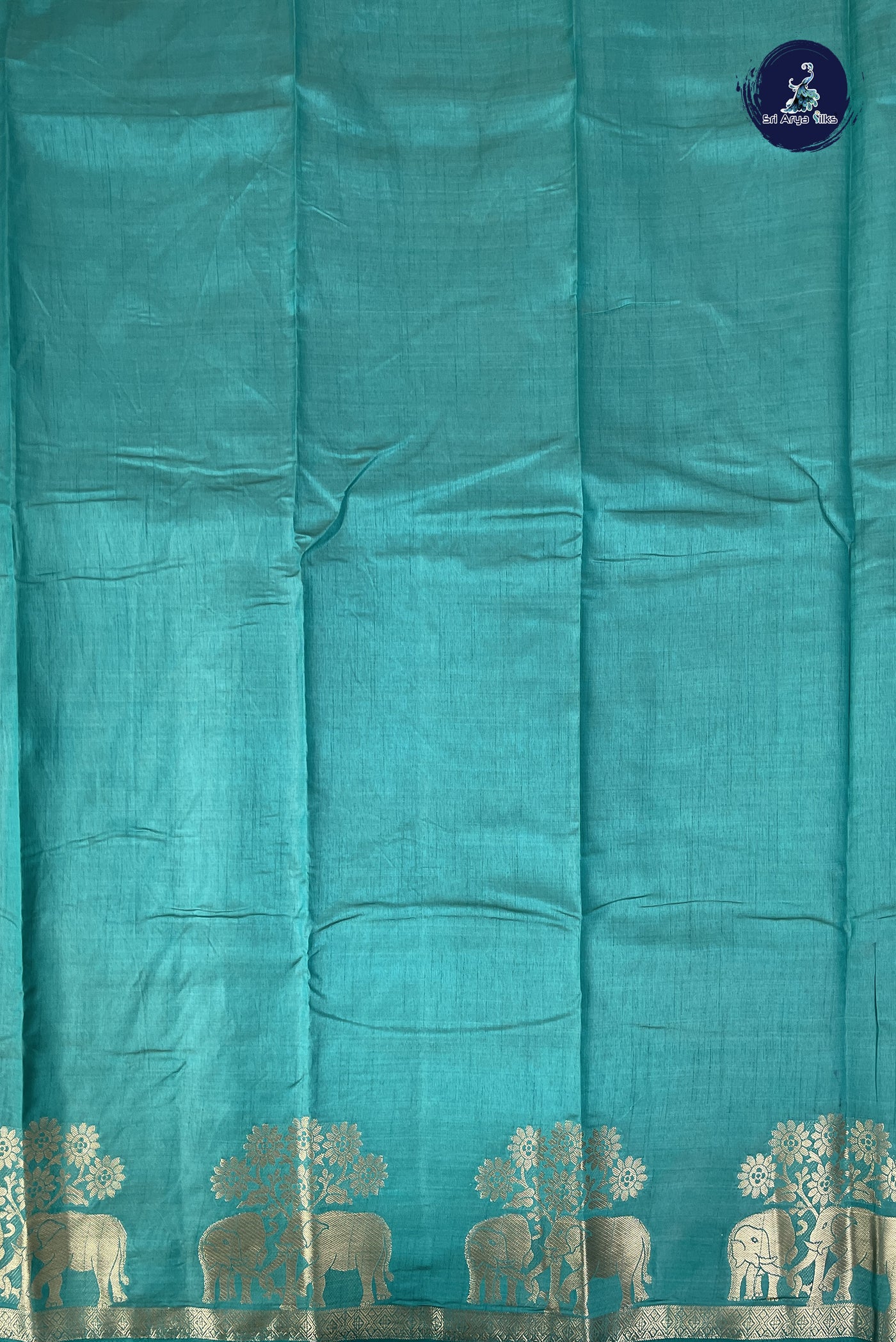 Teal Semi Tussar Saree With Plain Pattern