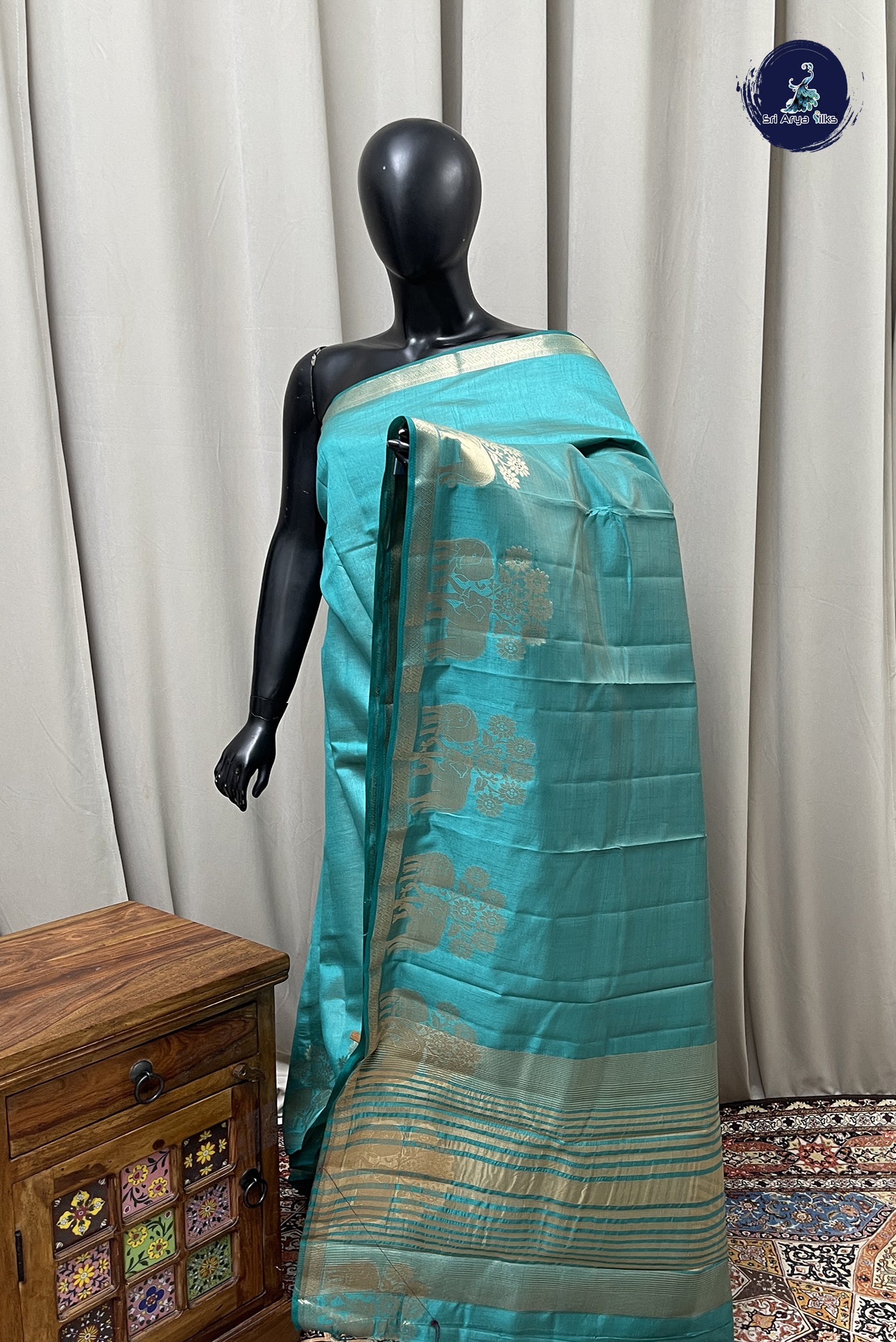 Teal Semi Tussar Saree With Plain Pattern