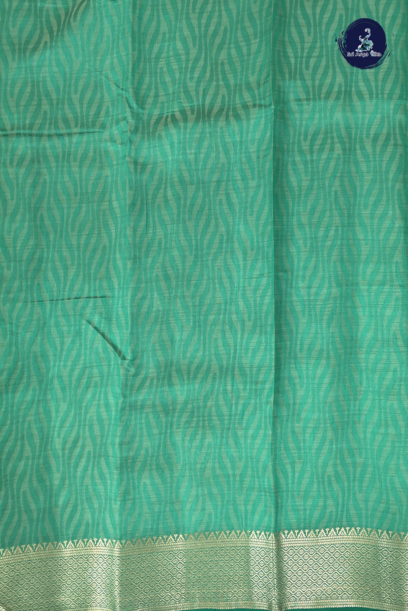 Green Semi Tussar Saree With Embossed Pattern