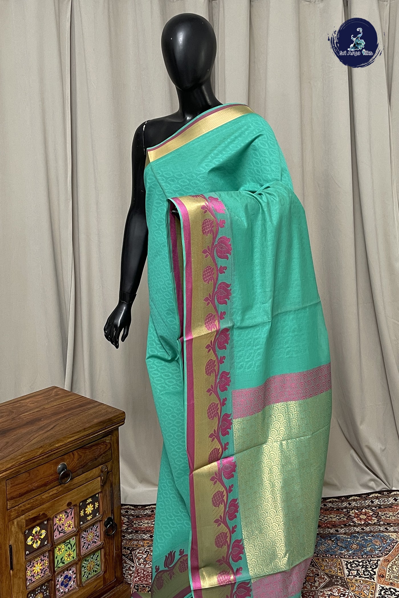 Green Cotton Saree With Embossed Pattern