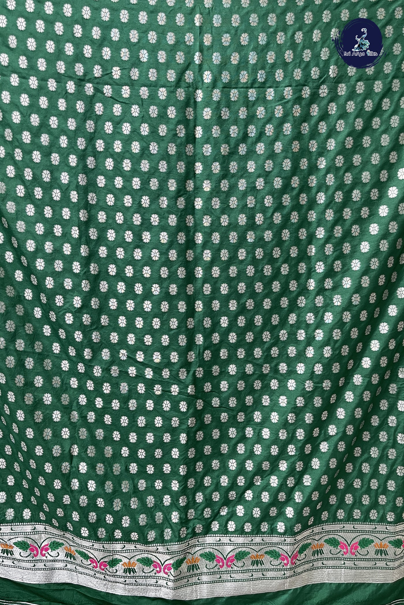 Dark Green Semi Raw Silk Saree With Embossed Pattern