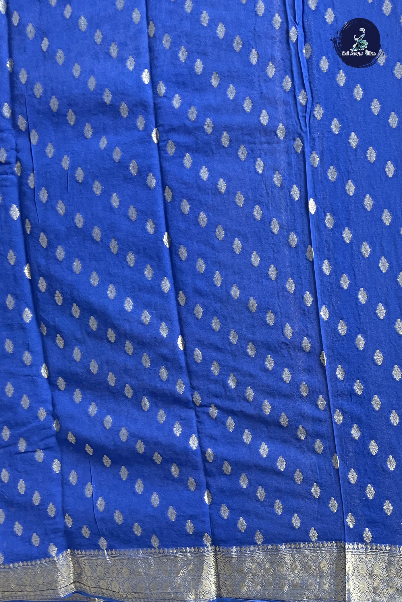 Blue Chiffon Saree With Zari Buttas Pattern