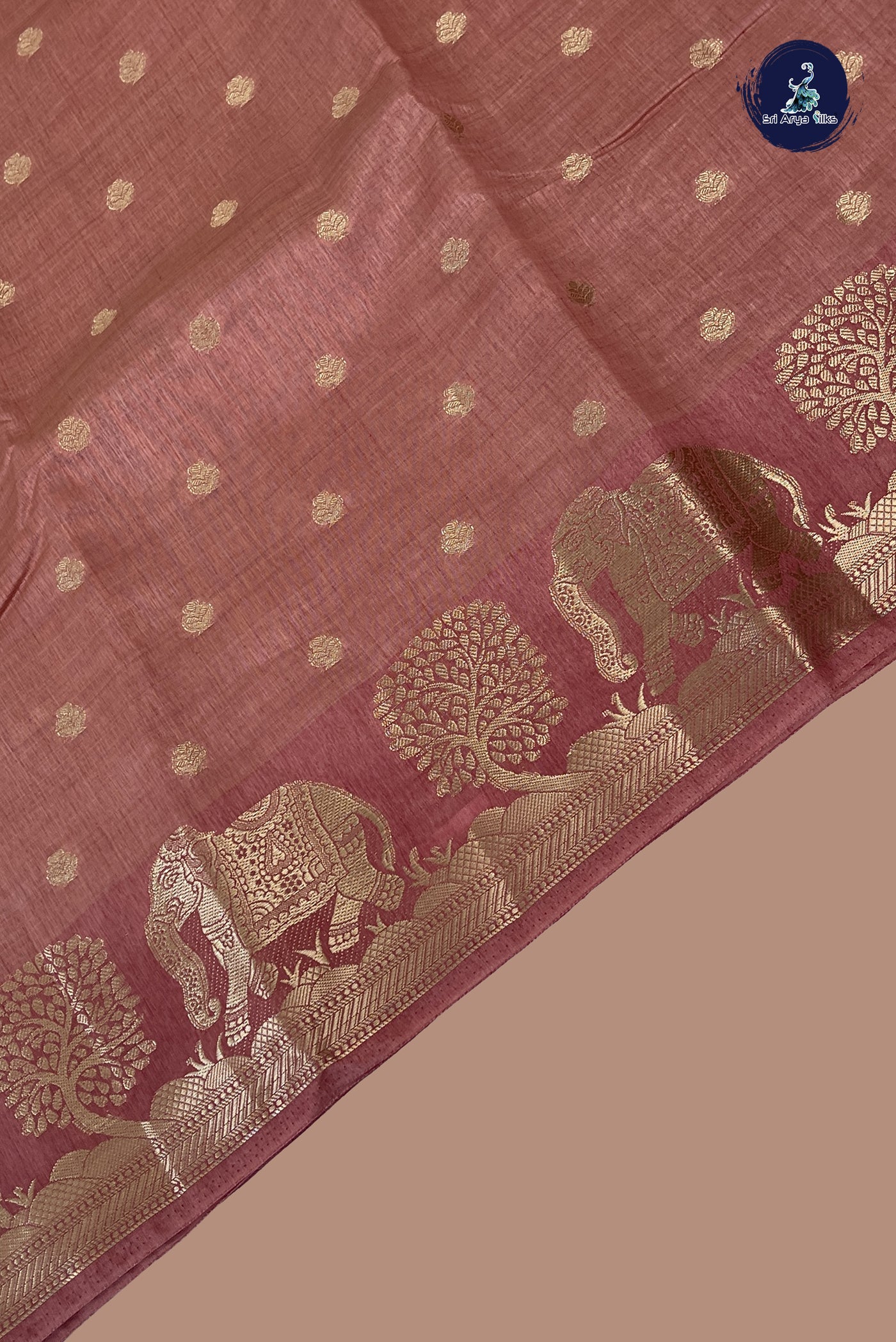 Dusty Pink Semi Tussar Saree With Zari Buttas Pattern