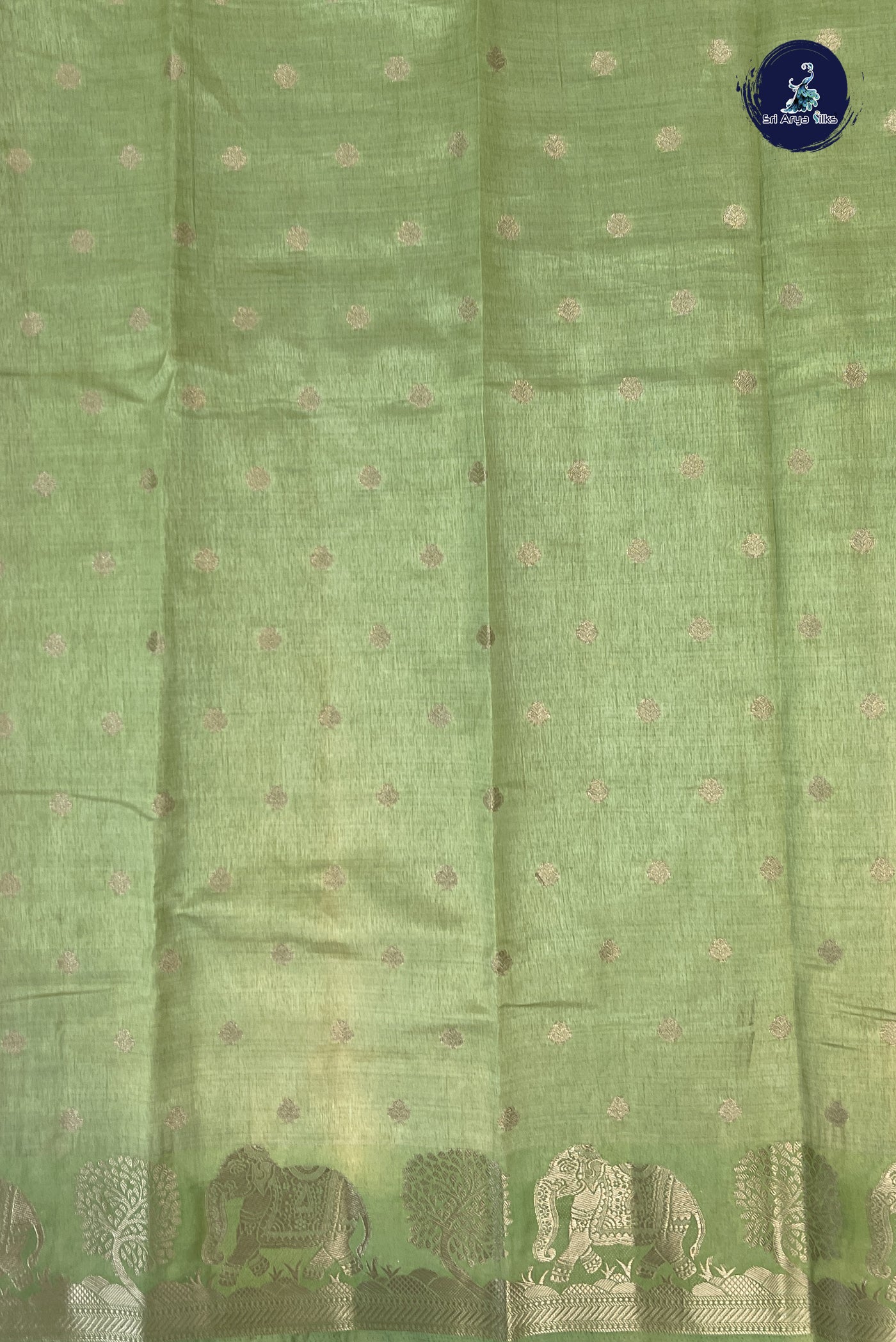 Pista Green Semi Tussar Saree With Zari Buttas Pattern