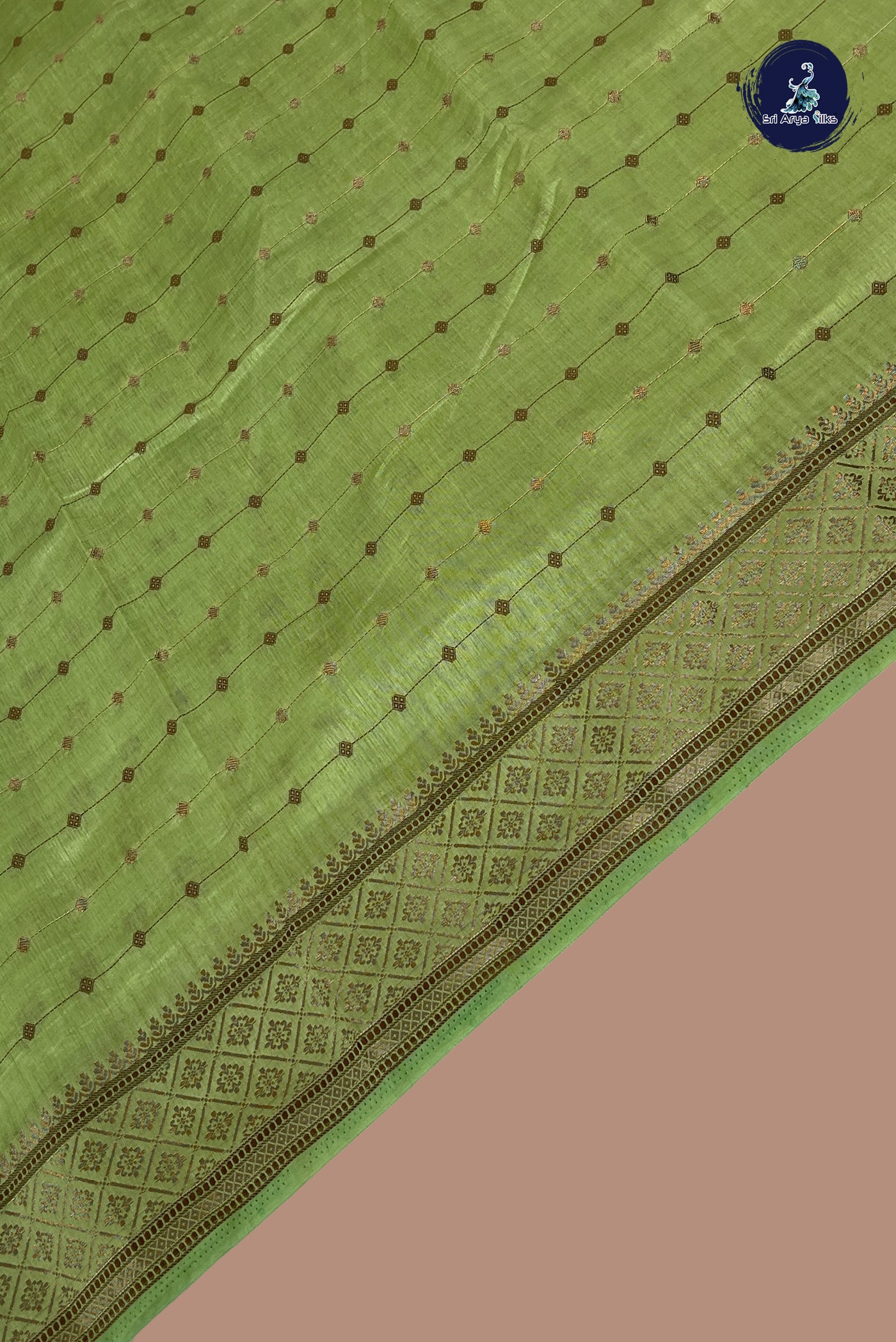 Light Green Semi Tussar Saree With Copper Zari Buttas Pattern