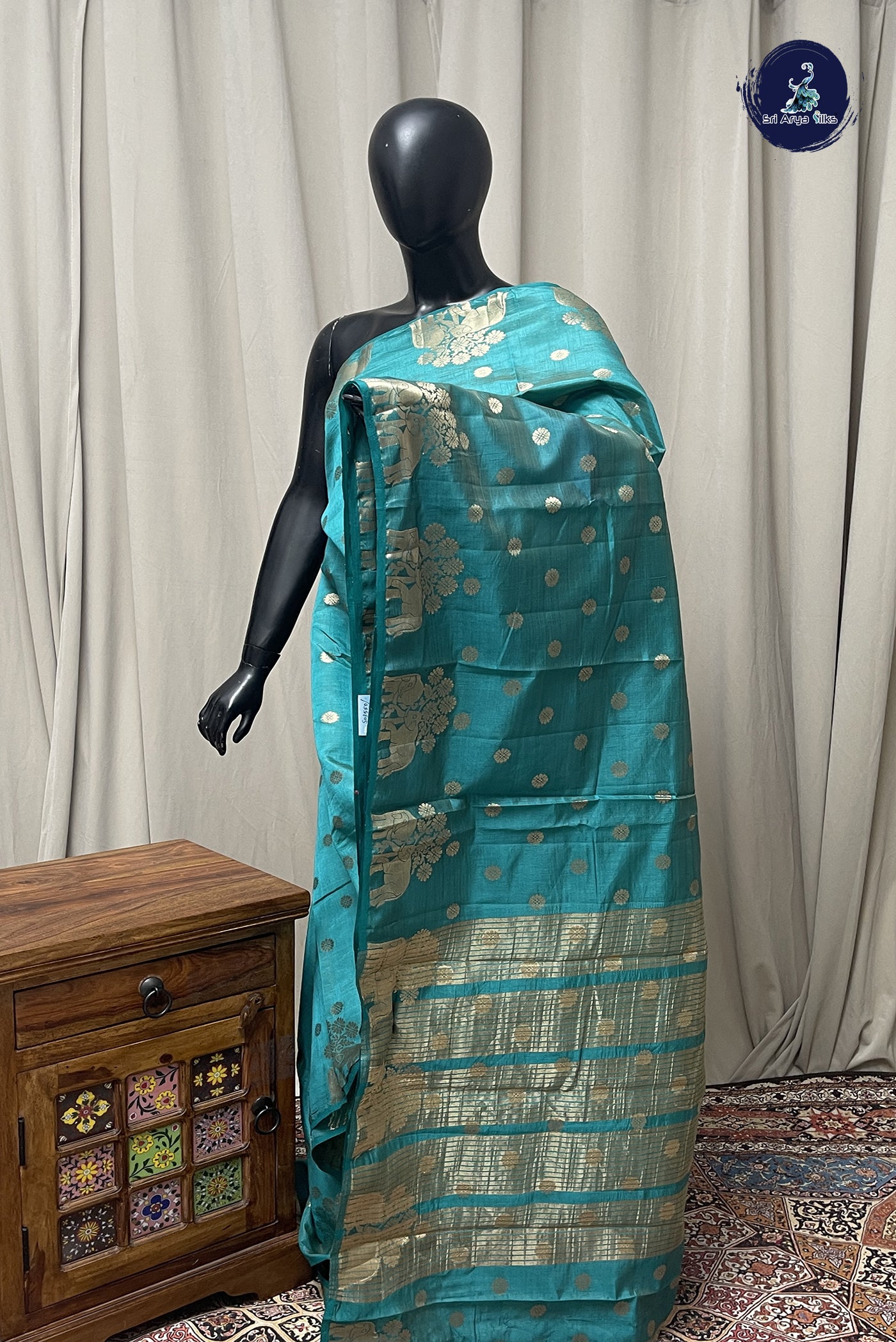 Teal Semi Tussar Saree With Zari Buttas Pattern