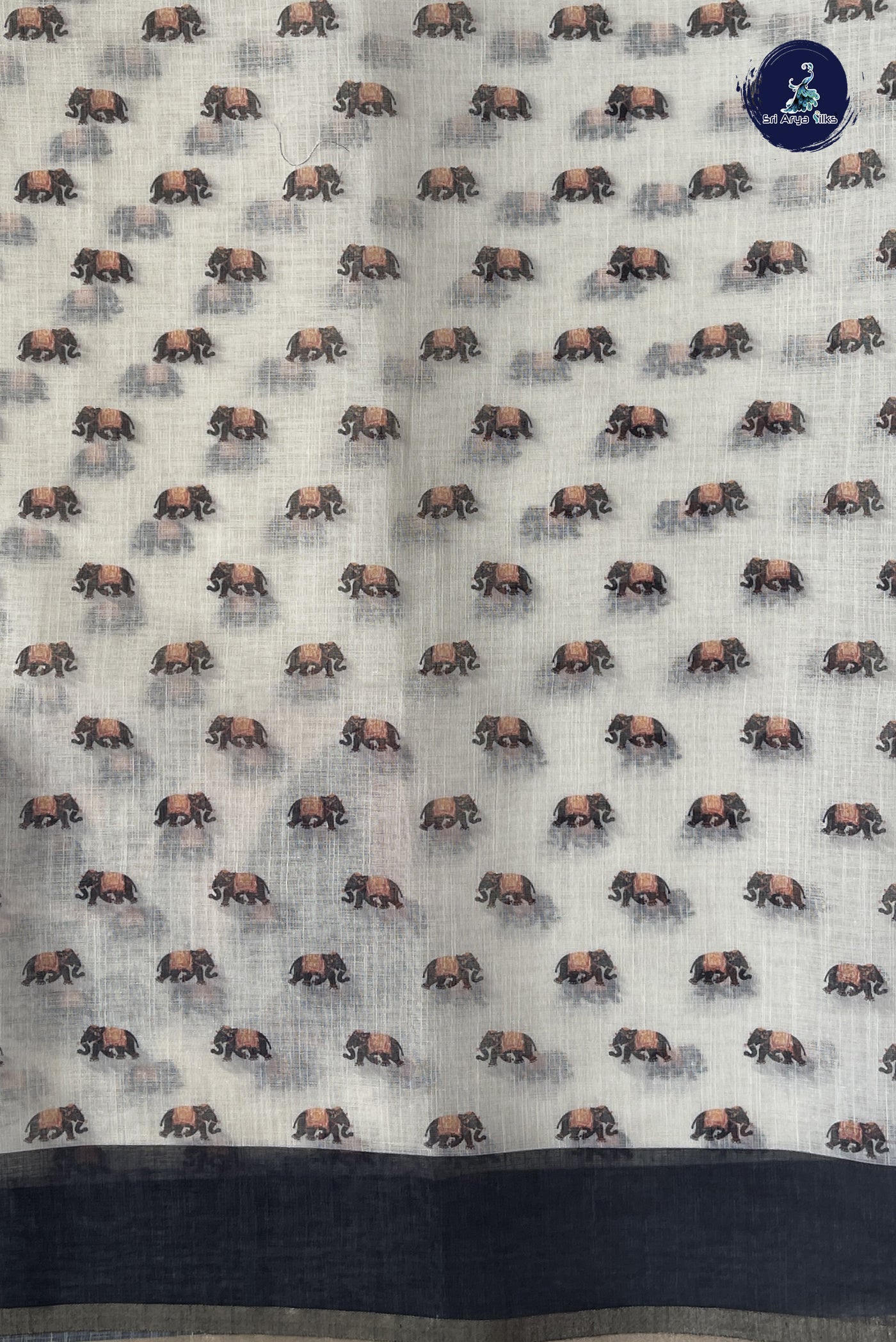 White Linen Saree With Printed Pattern