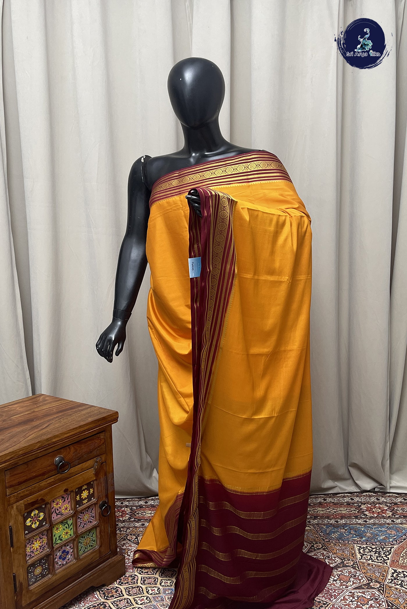 Lite Mustard Orange Semi Mysore Silk With Plain Pattern
