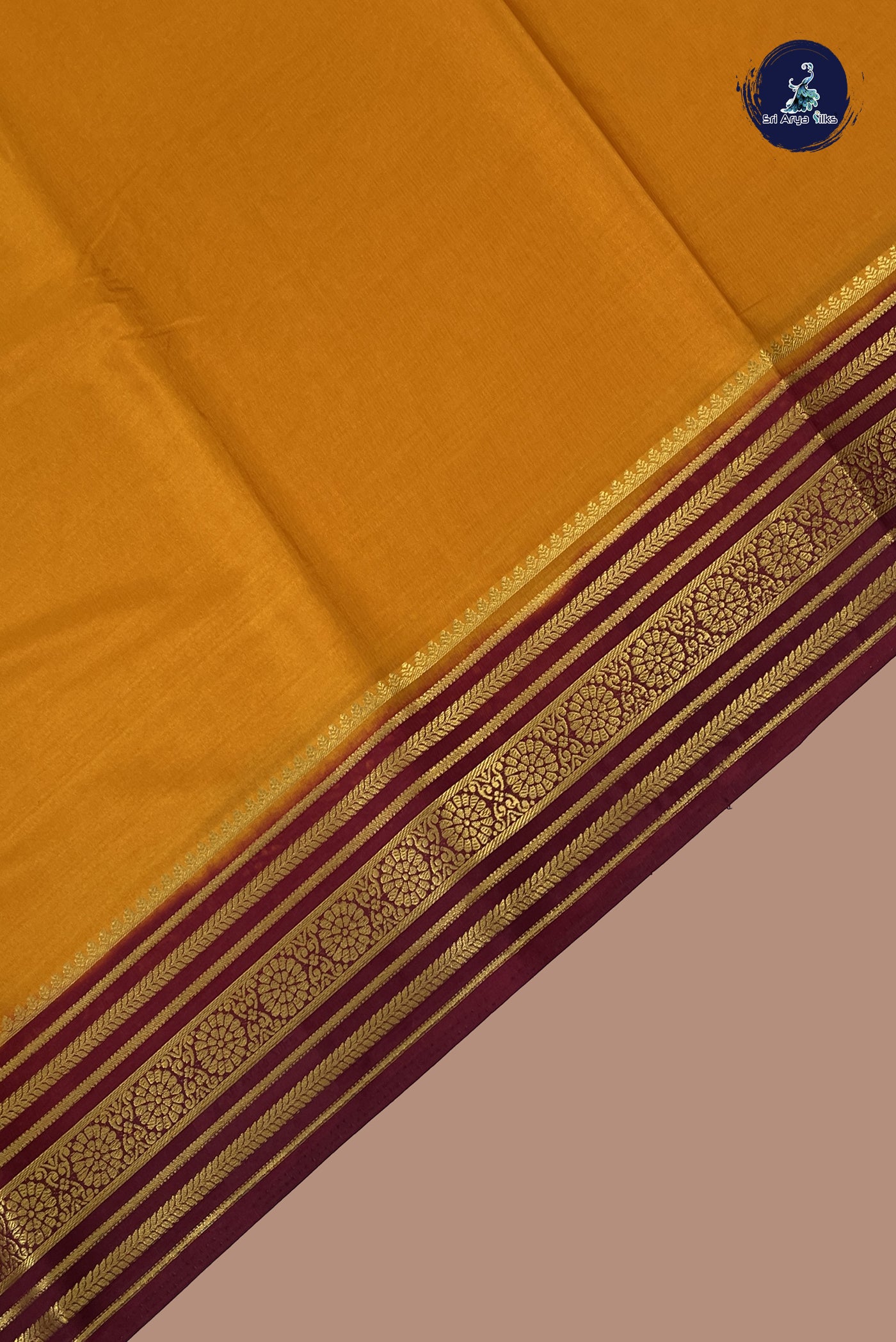 Lite Mustard Orange Semi Mysore Silk With Plain Pattern