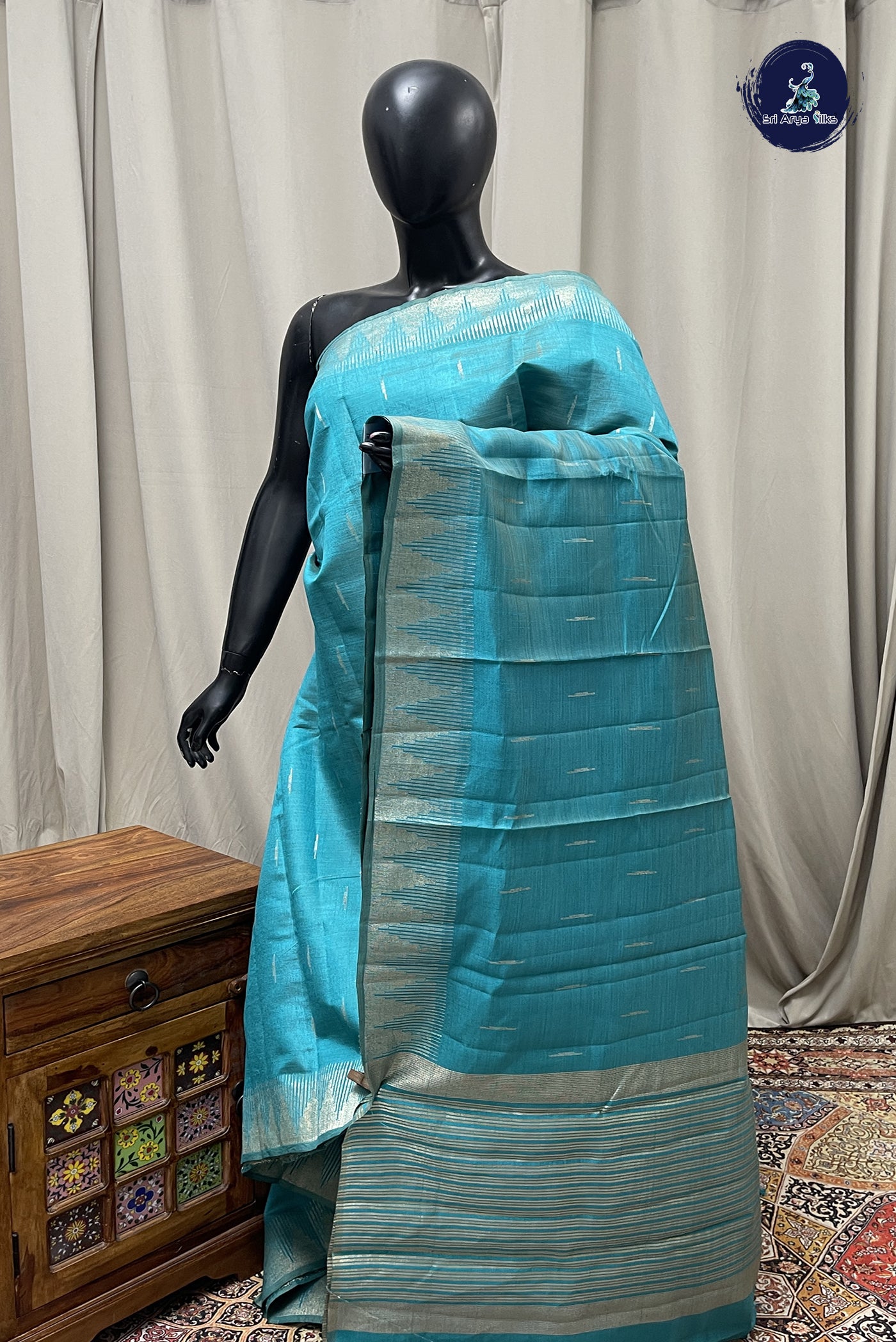 Teal Semi Tussar Saree With Zari Buttas Pattern