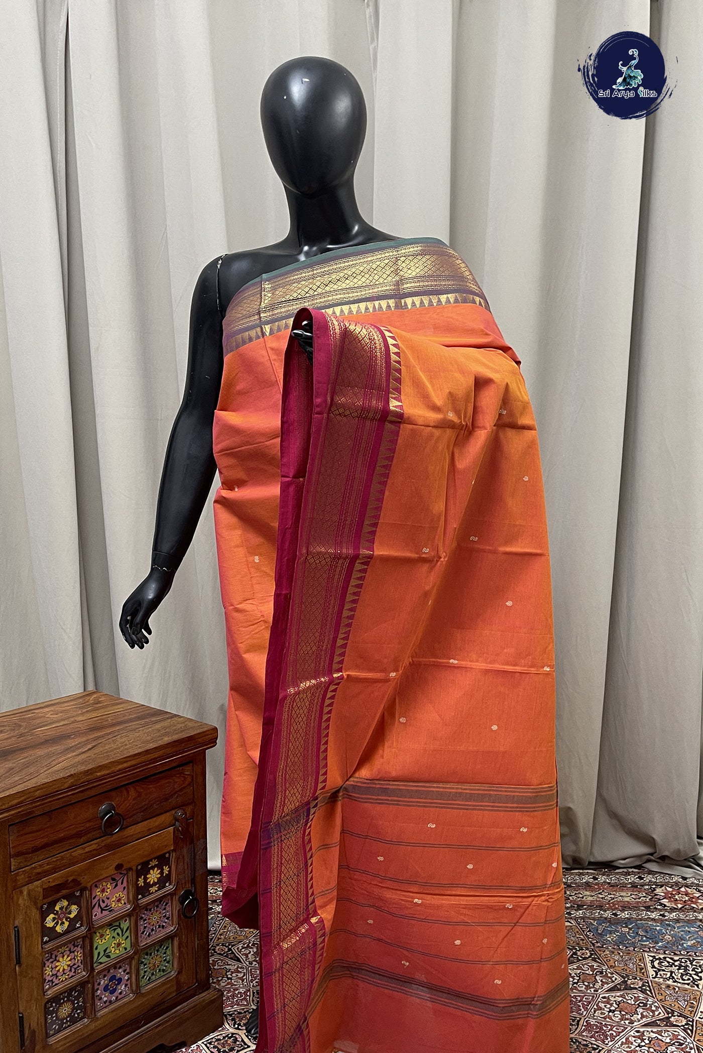 Orange Kanchi Cotton Saree With Buttas Pattern